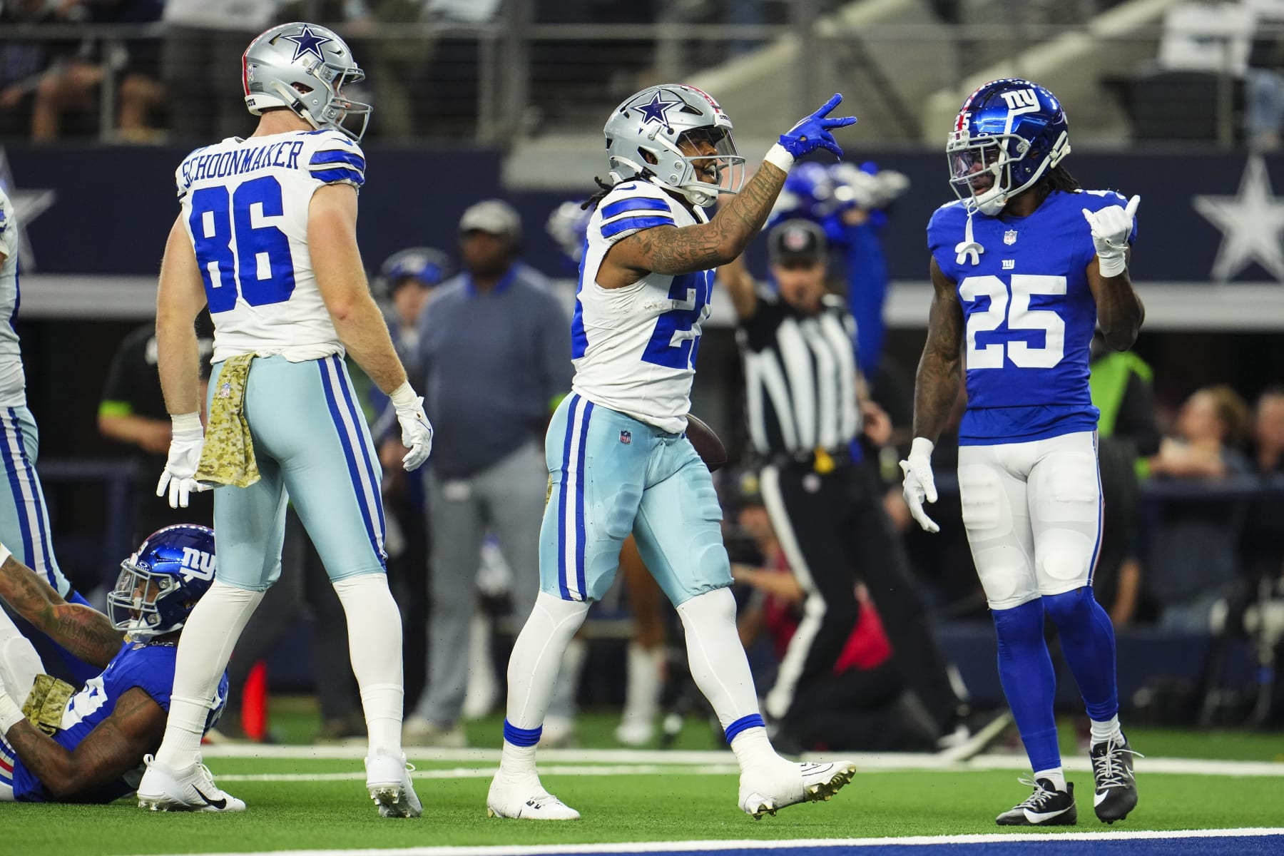 ARLINGTON, TX - NOVEMBER 12: Rico Dowdle #23 of the Dallas Cowboys celebrates during an NFL football game against the New York Giants at AT&T Stadium on November 12, 2023 in Arlington, Texas. (Photo by Cooper Neill/Getty Images)