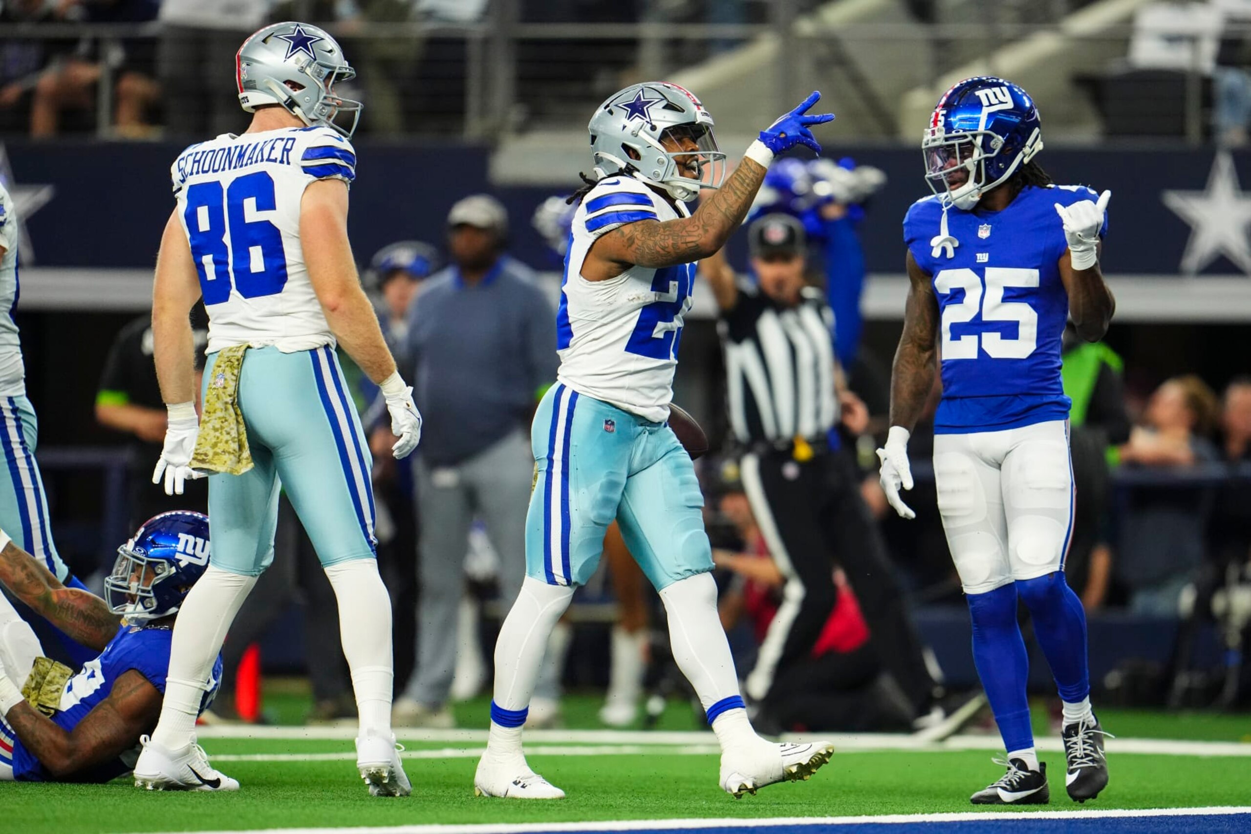 ARLINGTON, TX - NOVEMBER 12: Rico Dowdle #23 of the Dallas Cowboys celebrates during an NFL football game against the New York Giants at AT&T Stadium on November 12, 2023 in Arlington, Texas. (Photo by Cooper Neill/Getty Images)