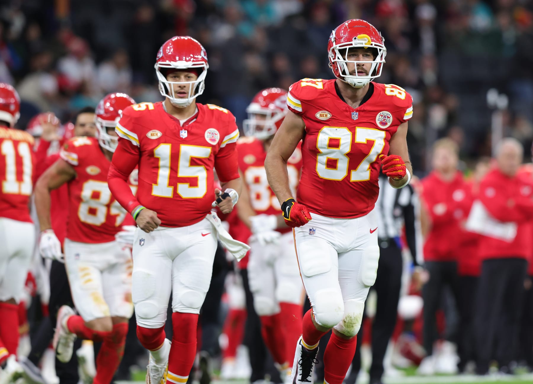 FRANKFURT AM MAIN, GERMANY - NOVEMBER 5: Travis Kelce of Kansas City Chiefs (R) and teammate Patrick Mahomes look on during the NFL match between Miami Dolphins and Kansas City Chiefs at Deutsche Bank Park on November 5, 2023 in Frankfurt am Main, Germany. (Photo by Ralf Ibing - firo sportphoto/Getty Images)