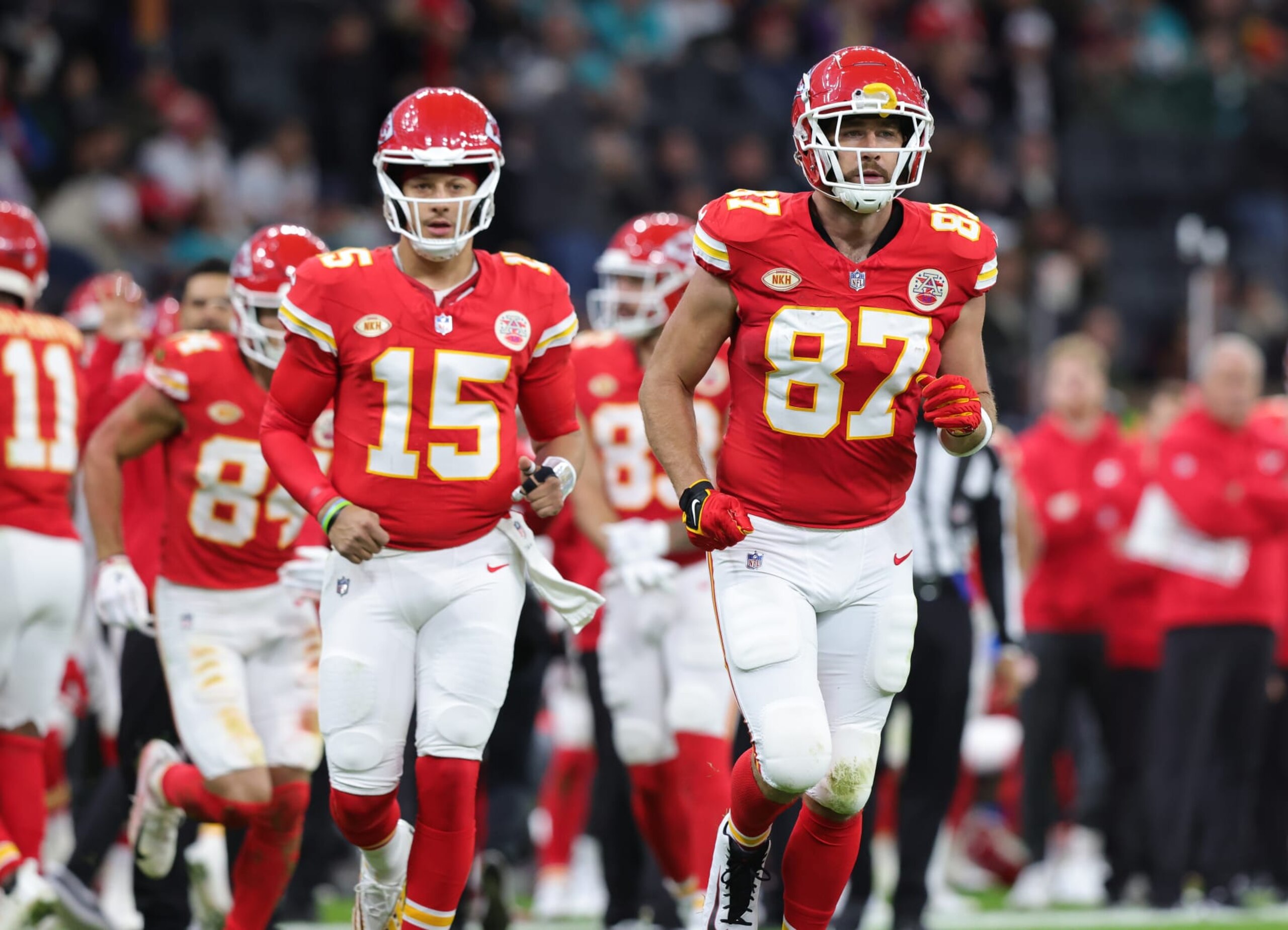 FRANKFURT AM MAIN, GERMANY - NOVEMBER 5: Travis Kelce of Kansas City Chiefs (R) and teammate Patrick Mahomes look on during the NFL match between Miami Dolphins and Kansas City Chiefs at Deutsche Bank Park on November 5, 2023 in Frankfurt am Main, Germany. (Photo by Ralf Ibing - firo sportphoto/Getty Images)