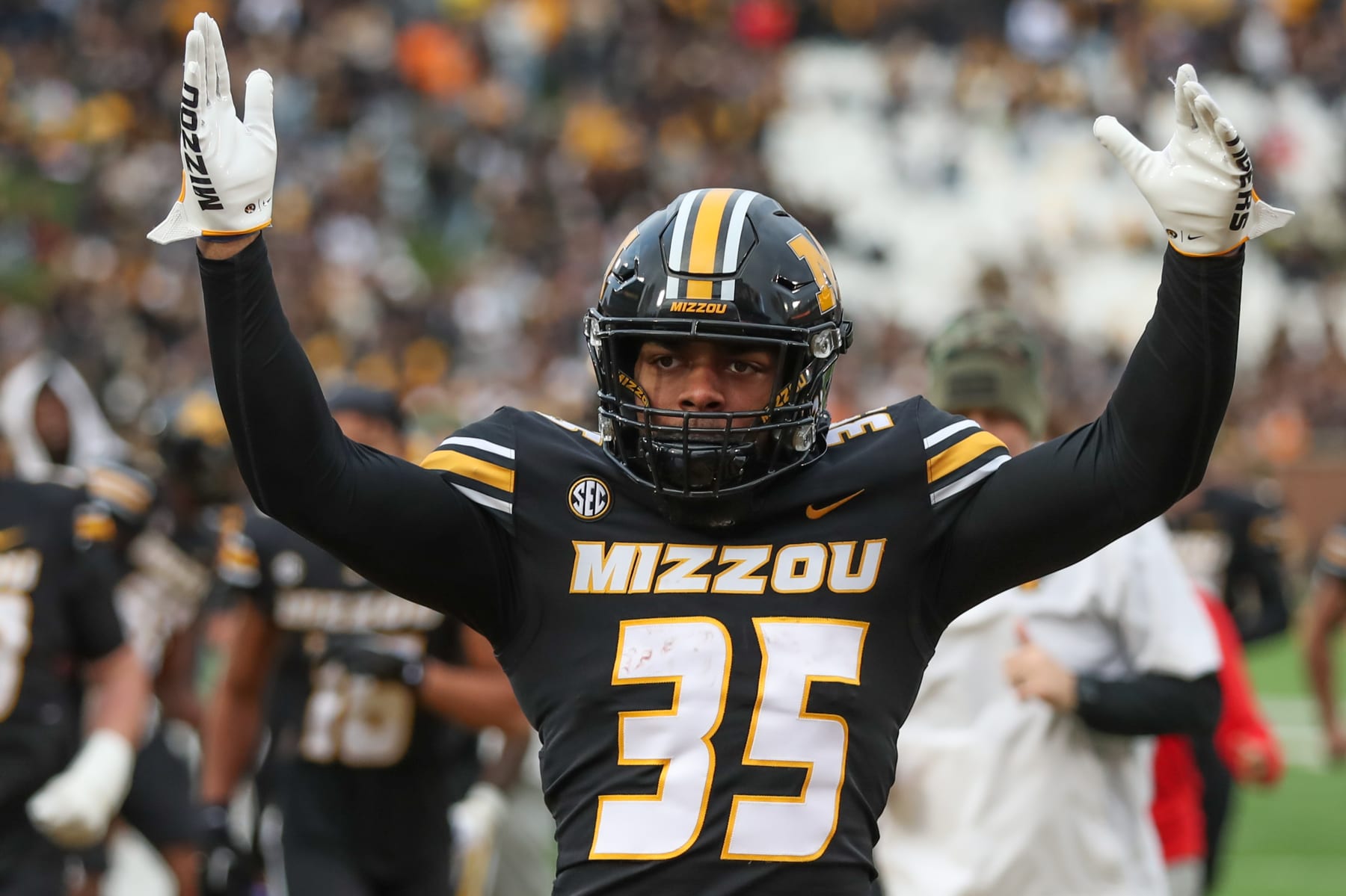 COLUMBIA, MO - NOVEMBER 11: Missouri Tigers running back Michael Cox (35) raises his hands to celebrate a field goal as time expired in the second quarter of an SEC football game between the Tennessee Volunteers and Missouri Tigers on Nov 11, 2023 at Memorial Stadium in Columbia, MO. (Photo by Scott Winters/Icon Sportswire via Getty Images)