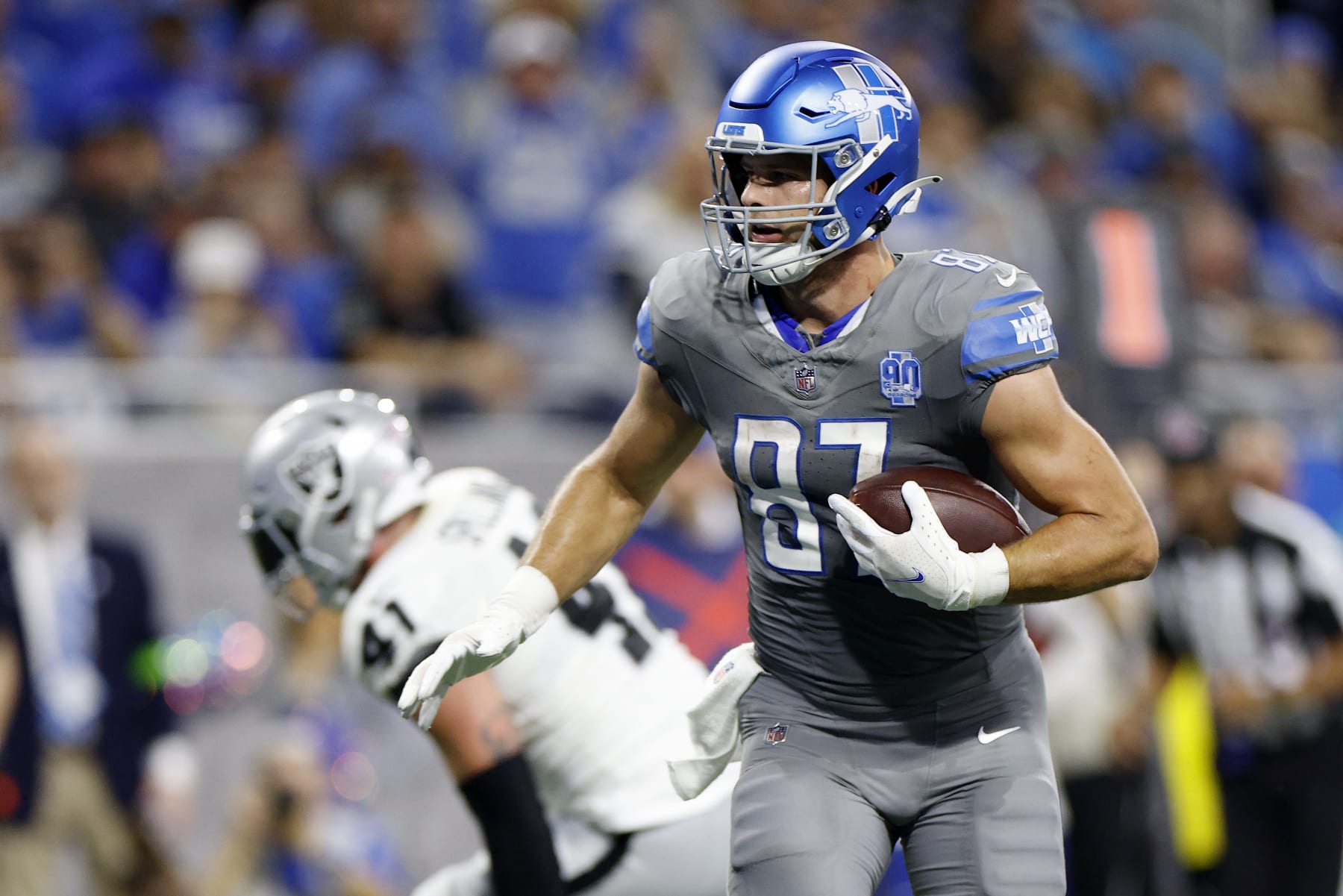 DETROIT, MICHIGAN - OCTOBER 30:  Sam LaPorta #87 of the Detroit Lions scores a touchdown in the second quarter against the Las Vegas Raiders at Ford Field on October 30, 2023 in Detroit, Michigan. (Photo by Mike Mulholland/Getty Images)