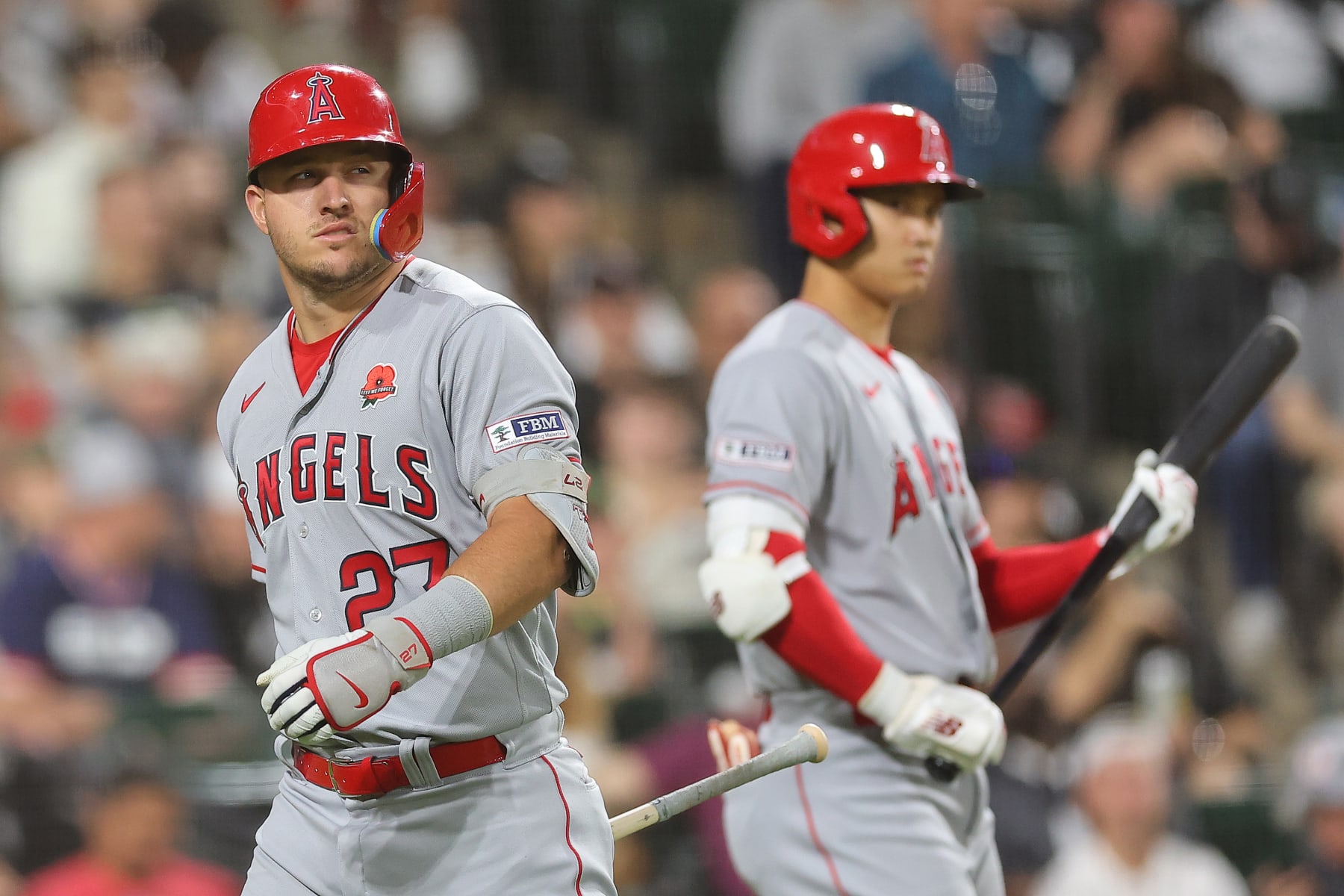 CHICAGO, ILLINOIS - MAY 29: Mike Trout #27 and Shohei Ohtani #17 of the Los Angeles Angels look on against the Chicago White Sox at Guaranteed Rate Field on May 29, 2023 in Chicago, Illinois. (Photo by Michael Reaves/Getty Images)
