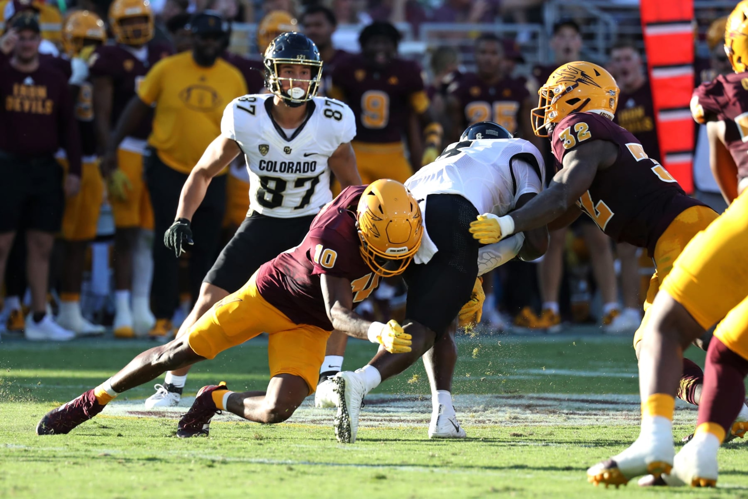 TEMPE, AZ - OCTOBER 07: Arizona State Sun Devils defensive back Ed Woods (10) tackles Colorado Buffaloes running back Kavosiey Smoke (8) during a football game between the Colorado Buffalos and the Arizona State Sun Devils on October 7th, 2023, at Mountain America Stadium, AZ. (Photo by Zac BonDurant/Icon Sportswire via Getty Images) TEMPE, AZ - OCTOBER 07: Arizona State Sun Devils defensive back Ed Woods (10) tackles Colorado Buffaloes running back Kavosiey Smoke (8) during a football game between the Colorado Buffalos and the Arizona State Sun Devils on October 7th, 2023, at Mountain America Stadium, AZ. (Photo by Zac BonDurant/Icon Sportswire via Getty Images)