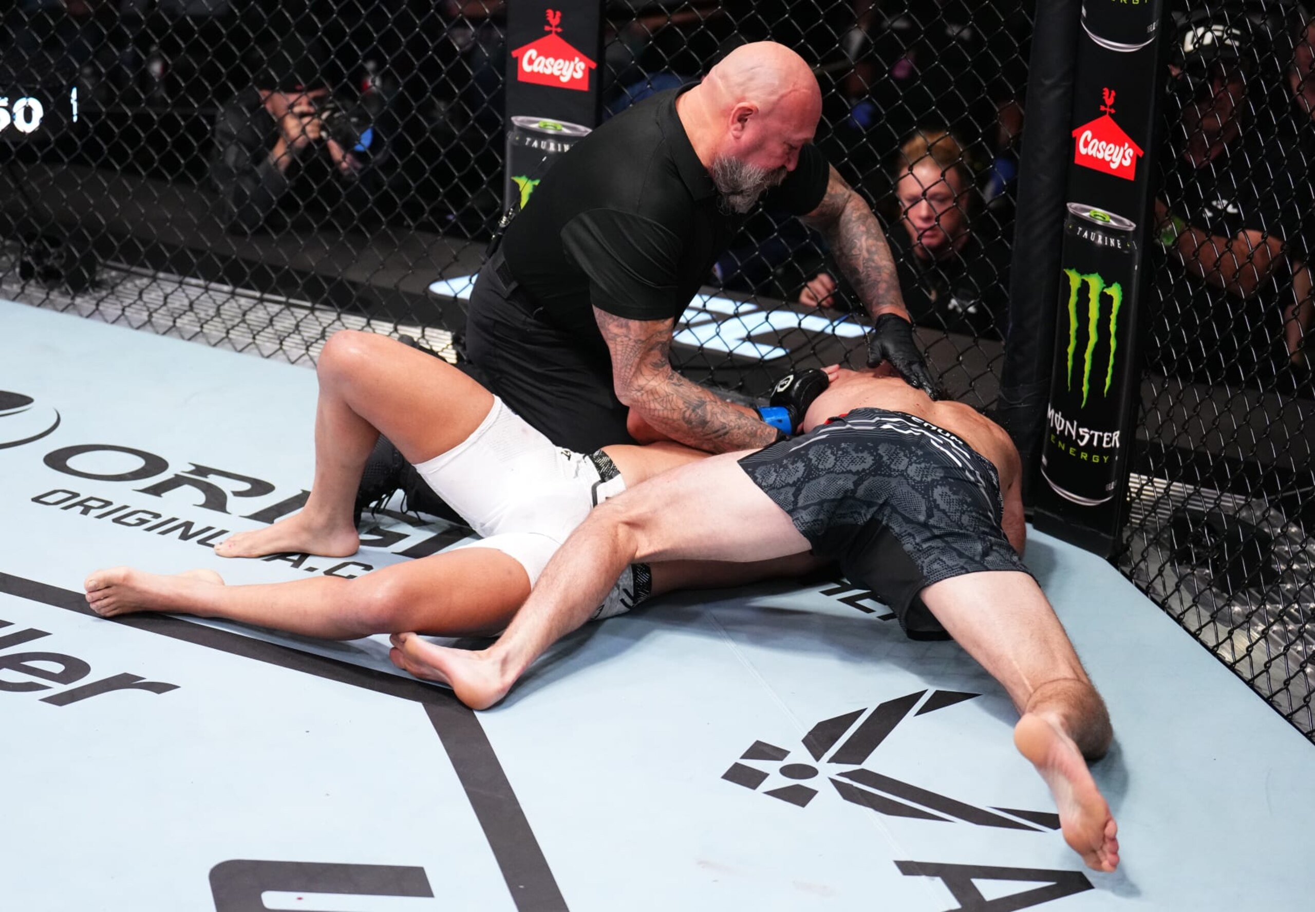 LAS VEGAS, NEVADA - NOVEMBER 18: (R-L) Trey Ogden secures a choke submission against Nikolas Motta of Brazil in a lightweight fight during the UFC Fight Night event at UFC APEX on November 18, 2023 in Las Vegas, Nevada. (Photo by Chris Unger/Zuffa LLC via Getty Images)