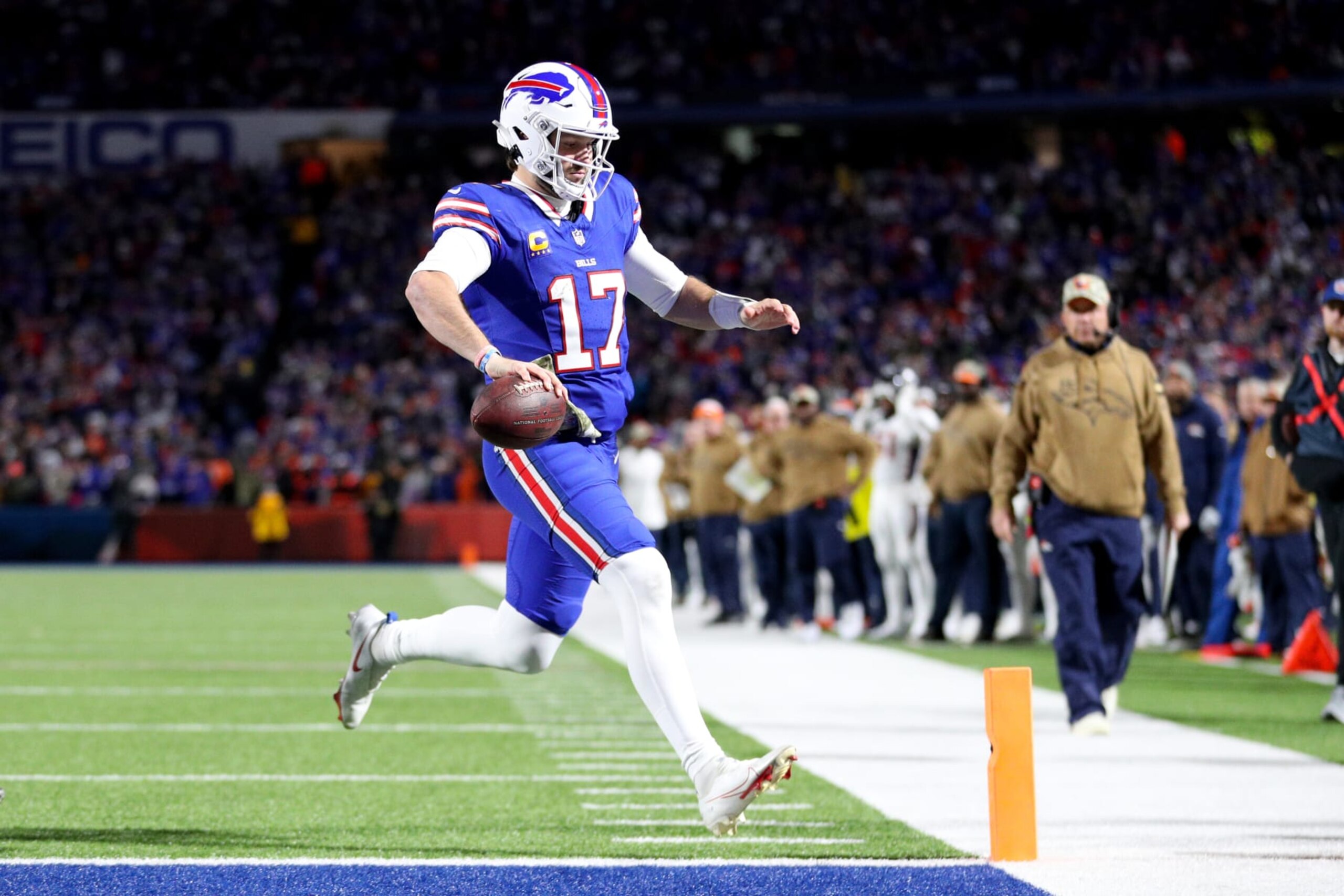 ORCHARD PARK, NEW YORK - NOVEMBER 13: Josh Allen #17 of the Buffalo Bills rushes for a touchdown against the Denver Broncos during the fourth quarter at Highmark Stadium on November 13, 2023 in Orchard Park, New York. (Photo by Bryan M. Bennett/Getty Images)