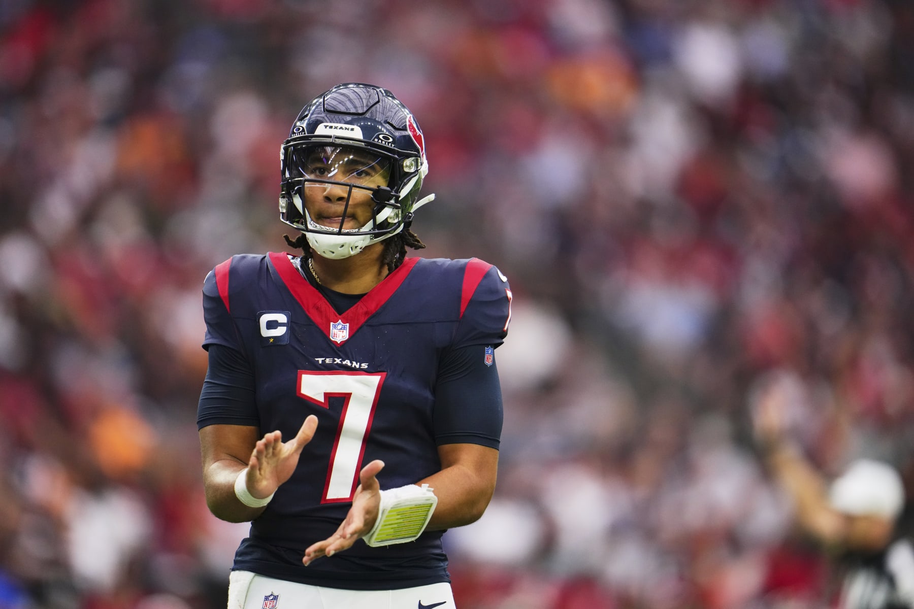 HOUSTON, TX - NOVEMBER 05: C.J. Stroud #7 of the Houston Texans reacts after a play against the Tampa Bay Buccaneers during the second half at NRG Stadium on November 5, 2023 in Houston, Texas. (Photo by Cooper Neill/Getty Images)