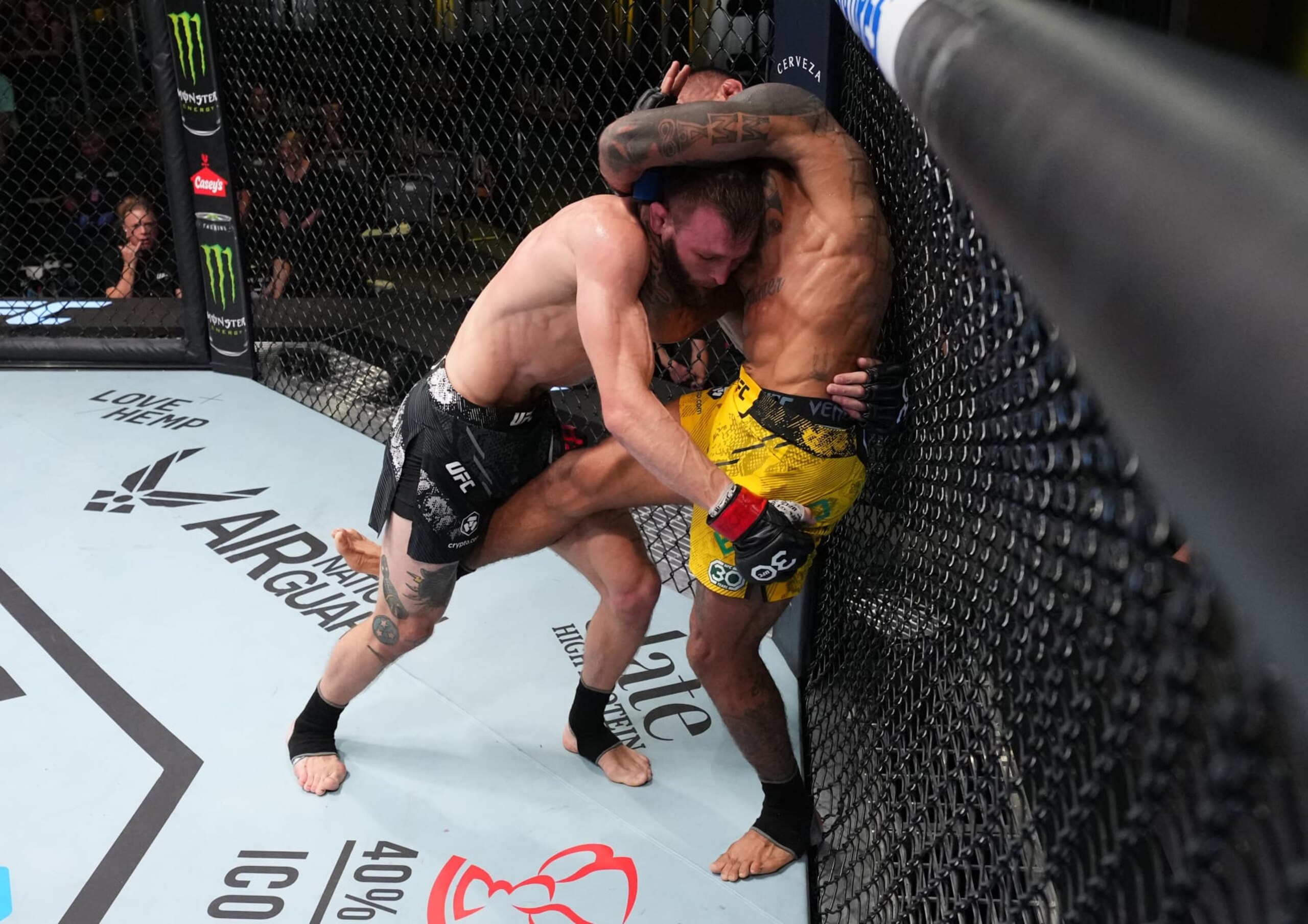 LAS VEGAS, NEVADA - NOVEMBER 18: Joanderson Brito of Brazil secures a choke submission against Jonathan Pearce in a featherweight fight during the UFC Fight Night event at UFC APEX on November 18, 2023 in Las Vegas, Nevada. (Photo by Chris Unger/Zuffa LLC via Getty Images)
