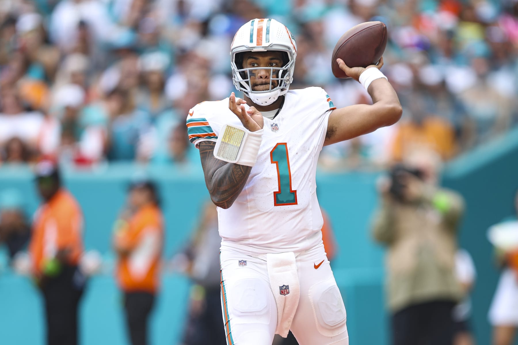 MIAMI GARDENS, FL - OCTOBER 29: Tua Tagovailoa #1 of the Miami Dolphins throws the ball during an NFL football game against the New England Patriots at Hard Rock Stadium on October 29, 2023 in Miami Gardens, Florida. (Photo by Perry Knotts/Getty Images)