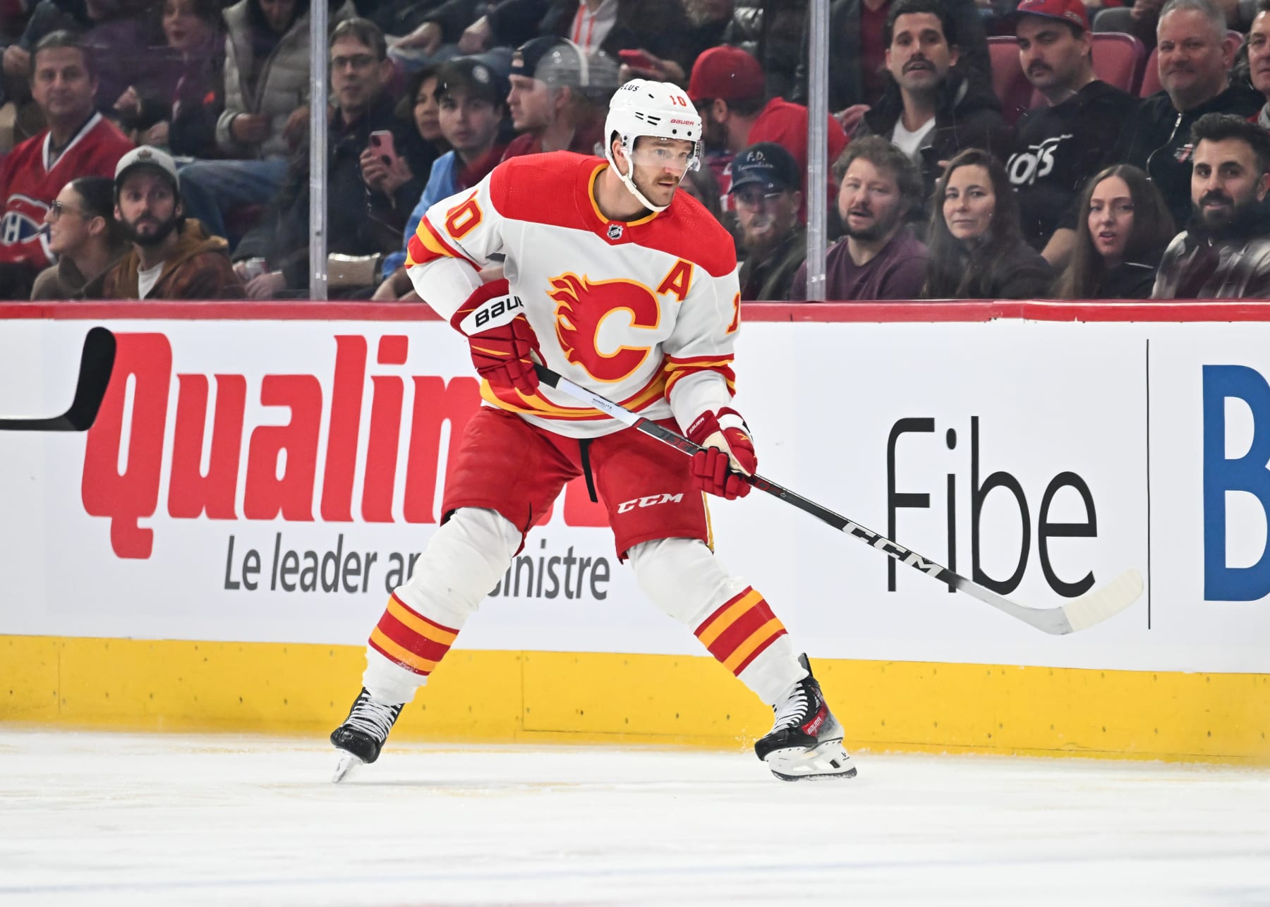 MONTREAL, CANADA - NOVEMBER 14:  Jonathan Huberdeau #10 of the Calgary Flames skates during the first period against the Montreal Canadiens at the Bell Centre on November 14, 2023 in Montreal, Quebec, Canada.  The Calgary Flames defeated the Montreal Canadiens 2-1.  (Photo by Minas Panagiotakis/Getty Images)