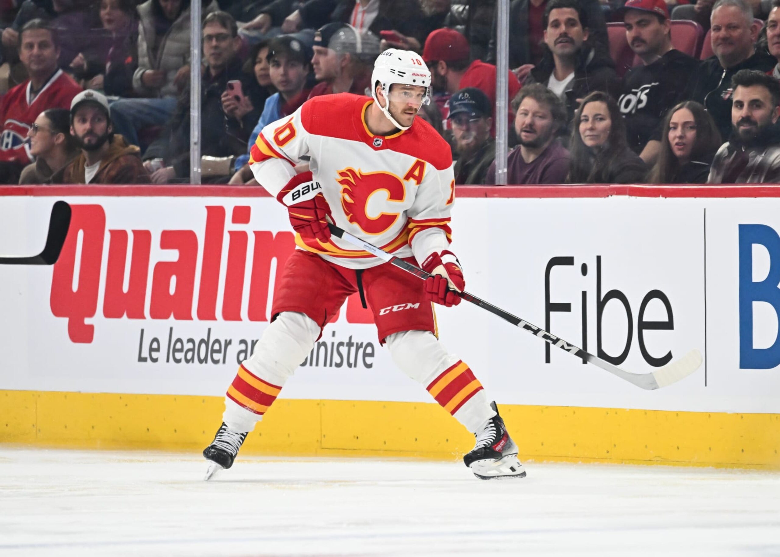 MONTREAL, CANADA - NOVEMBER 14:  Jonathan Huberdeau #10 of the Calgary Flames skates during the first period against the Montreal Canadiens at the Bell Centre on November 14, 2023 in Montreal, Quebec, Canada.  The Calgary Flames defeated the Montreal Canadiens 2-1.  (Photo by Minas Panagiotakis/Getty Images)
