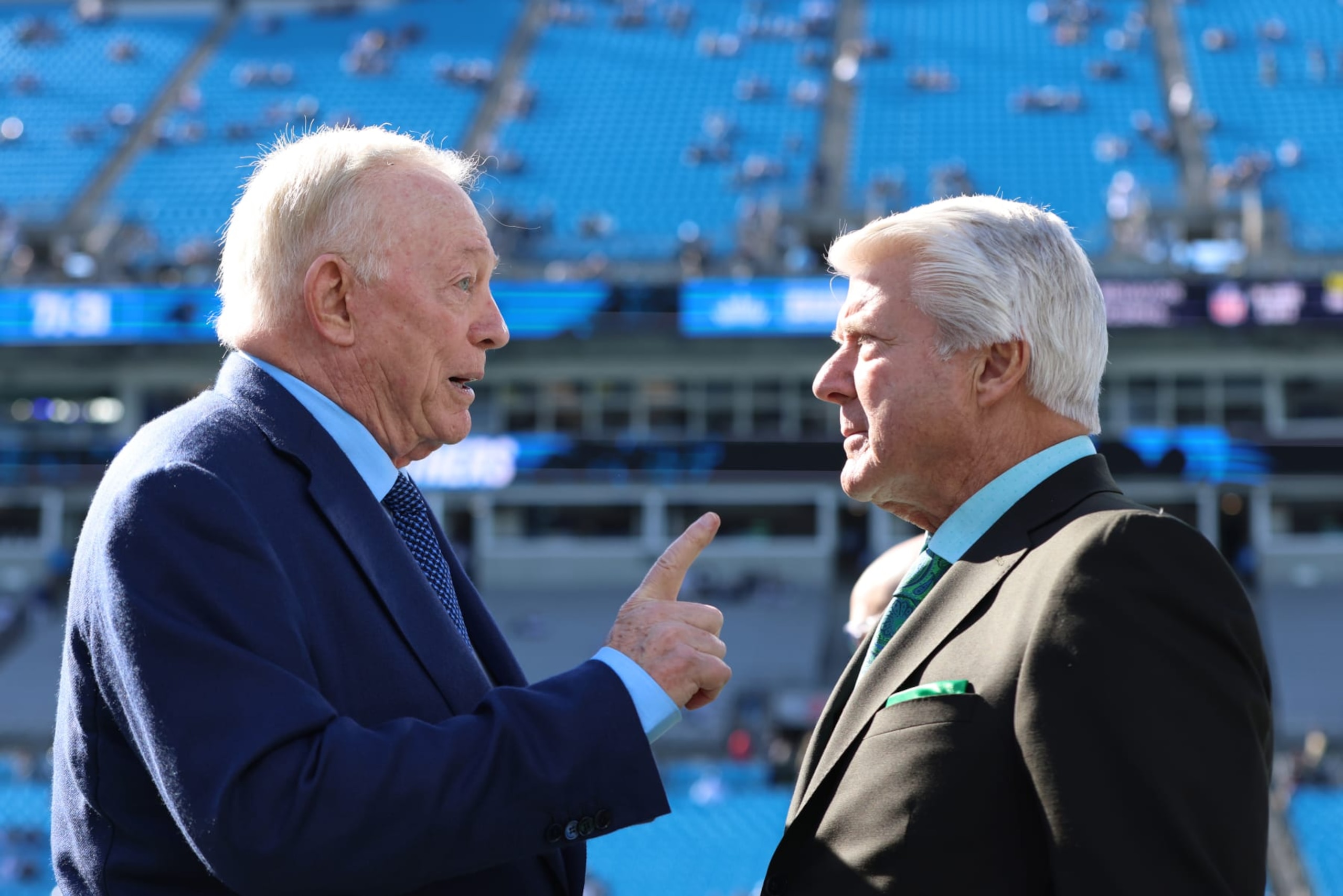 CHARLOTTE, NORTH CAROLINA - NOVEMBER 19: Dallas Cowboys owner Jerry Jones speaks with Jimmy Johnson before the game against the Carolina Panthers at Bank of America Stadium on November 19, 2023 in Charlotte, North Carolina. (Photo by David Jensen/Getty Images)