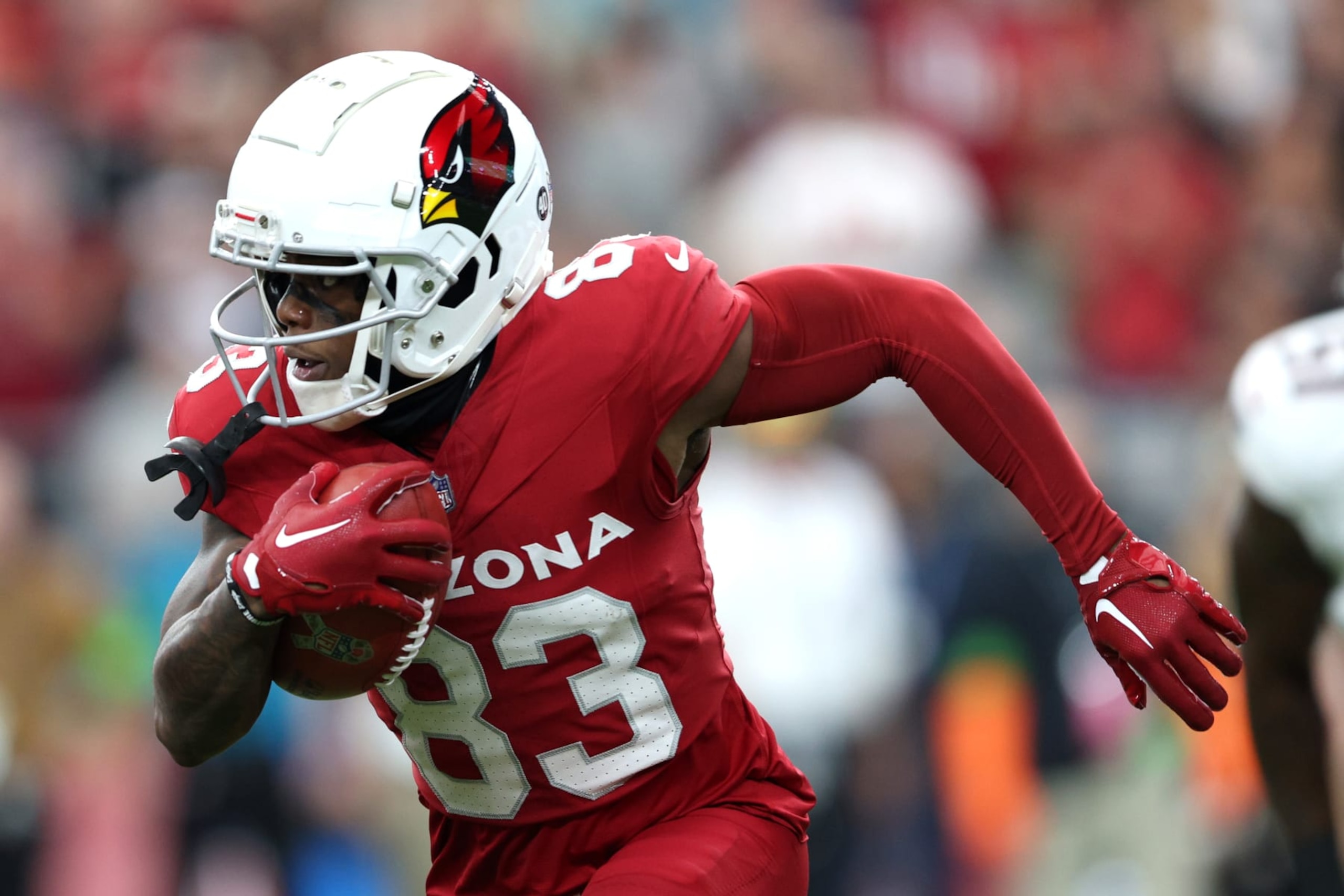 GLENDALE, ARIZONA - NOVEMBER 12: Greg Dortch #83 of the Arizona Cardinals returns the kickoff against the Atlanta Falcons during the first quarter at State Farm Stadium on November 12, 2023 in Glendale, Arizona. (Photo by Mike Christy/Getty Images)