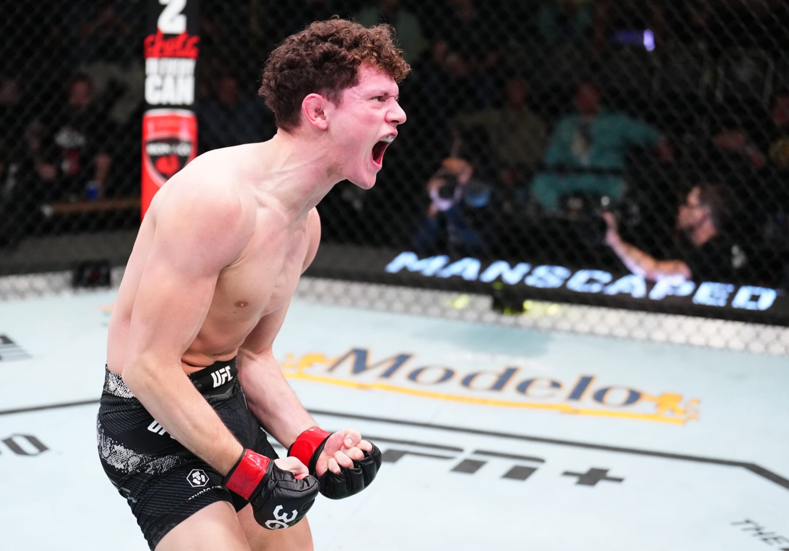LAS VEGAS, NEVADA - NOVEMBER 18: Chase Hooper reacts after his submission victory against Jordan Leavitt in a lightweight fight during the UFC Fight Night event at UFC APEX on November 18, 2023 in Las Vegas, Nevada. (Photo by Chris Unger/Zuffa LLC via Getty Images)