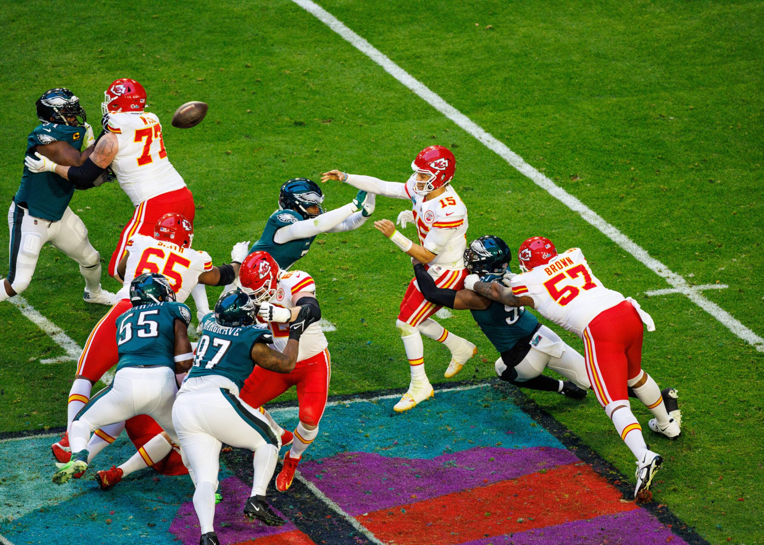 GLENDALE, AZ - FEBRUARY 12: Kansas City Chiefs quarterback Patrick Mahomes (15) throws a pass under pressure during Super Bowl LVII between the Philadelphia Eagles and the Kansas City Chiefs on Sunday, February 12th, 2023 at State Farm Stadium in Glendale, AZ. (Photo by Adam Bow/Icon Sportswire via Getty Images)