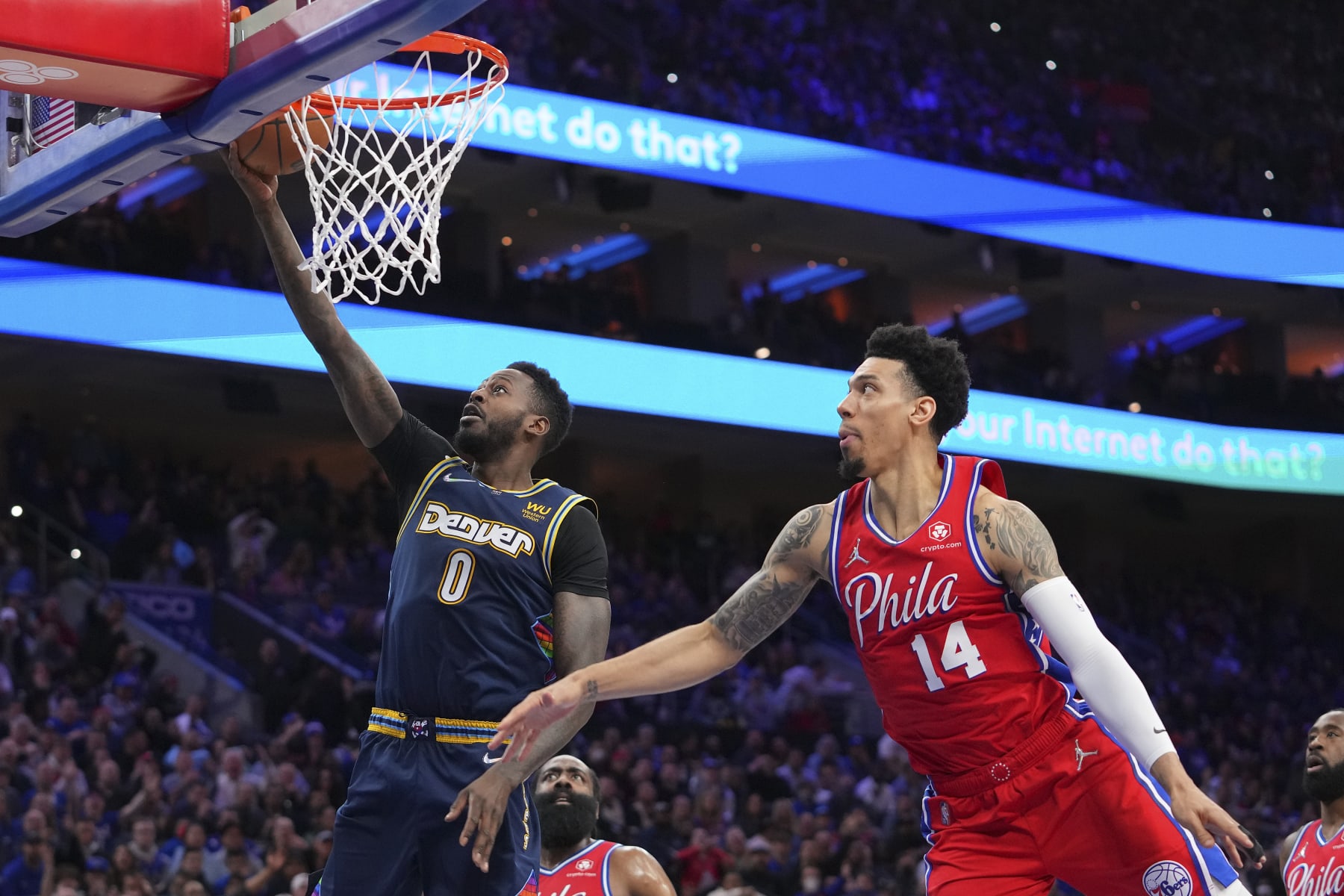PHILADELPHIA, PA - MARCH 14: JaMychal Green #0 of the Denver Nuggets shoots the ball against Danny Green #14 of the Philadelphia 76ers at the Wells Fargo Center on March 14, 2022 in Philadelphia, Pennsylvania. The Nuggets defeated the 76ers 114-110. NOTE TO USER: User expressly acknowledges and agrees that, by downloading and or using this photograph, User is consenting to the terms and conditions of the Getty Images License Agreement. (Photo by Mitchell Leff/Getty Images)