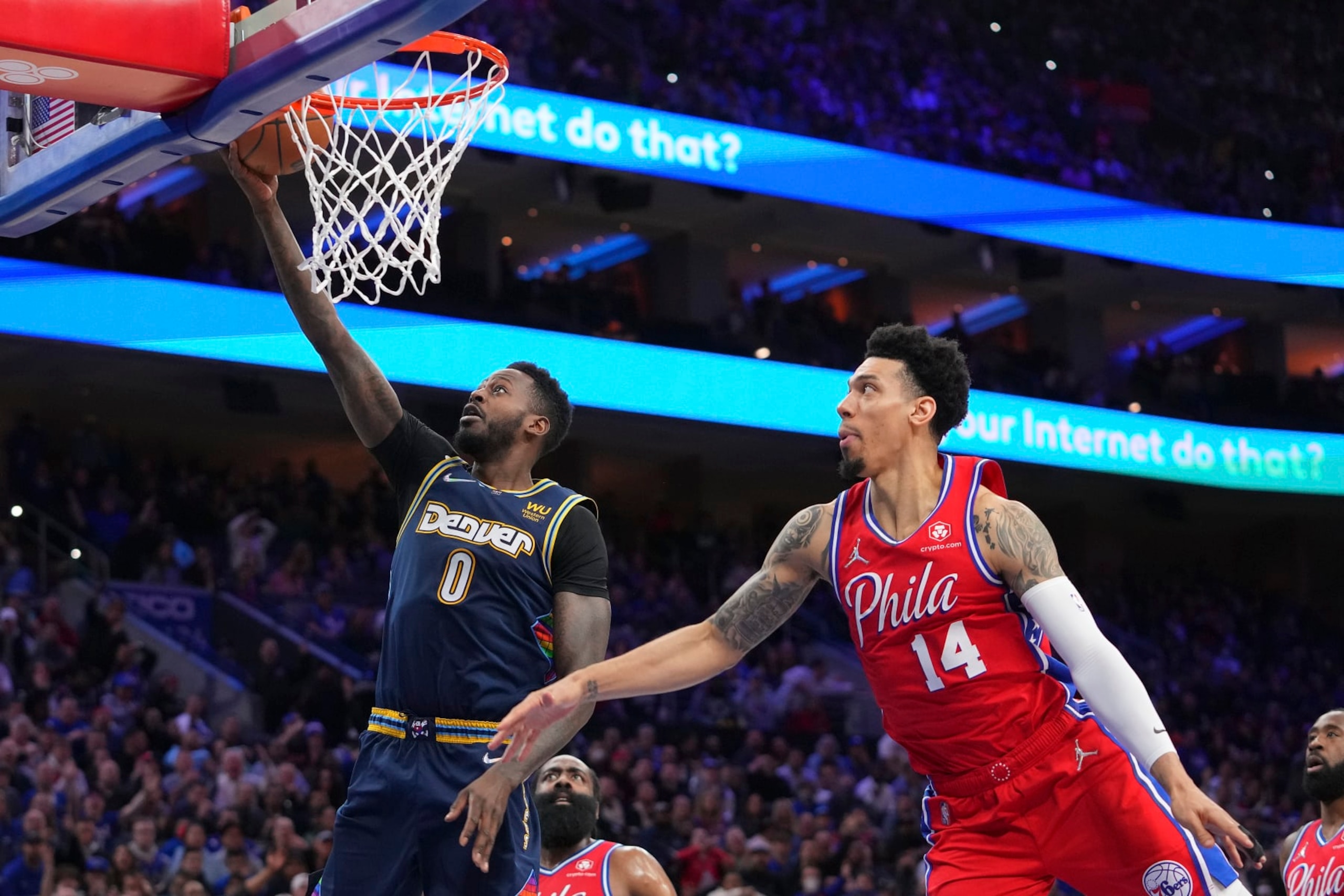 PHILADELPHIA, PA - MARCH 14: JaMychal Green #0 of the Denver Nuggets shoots the ball against Danny Green #14 of the Philadelphia 76ers at the Wells Fargo Center on March 14, 2022 in Philadelphia, Pennsylvania. The Nuggets defeated the 76ers 114-110. NOTE TO USER: User expressly acknowledges and agrees that, by downloading and or using this photograph, User is consenting to the terms and conditions of the Getty Images License Agreement. (Photo by Mitchell Leff/Getty Images)