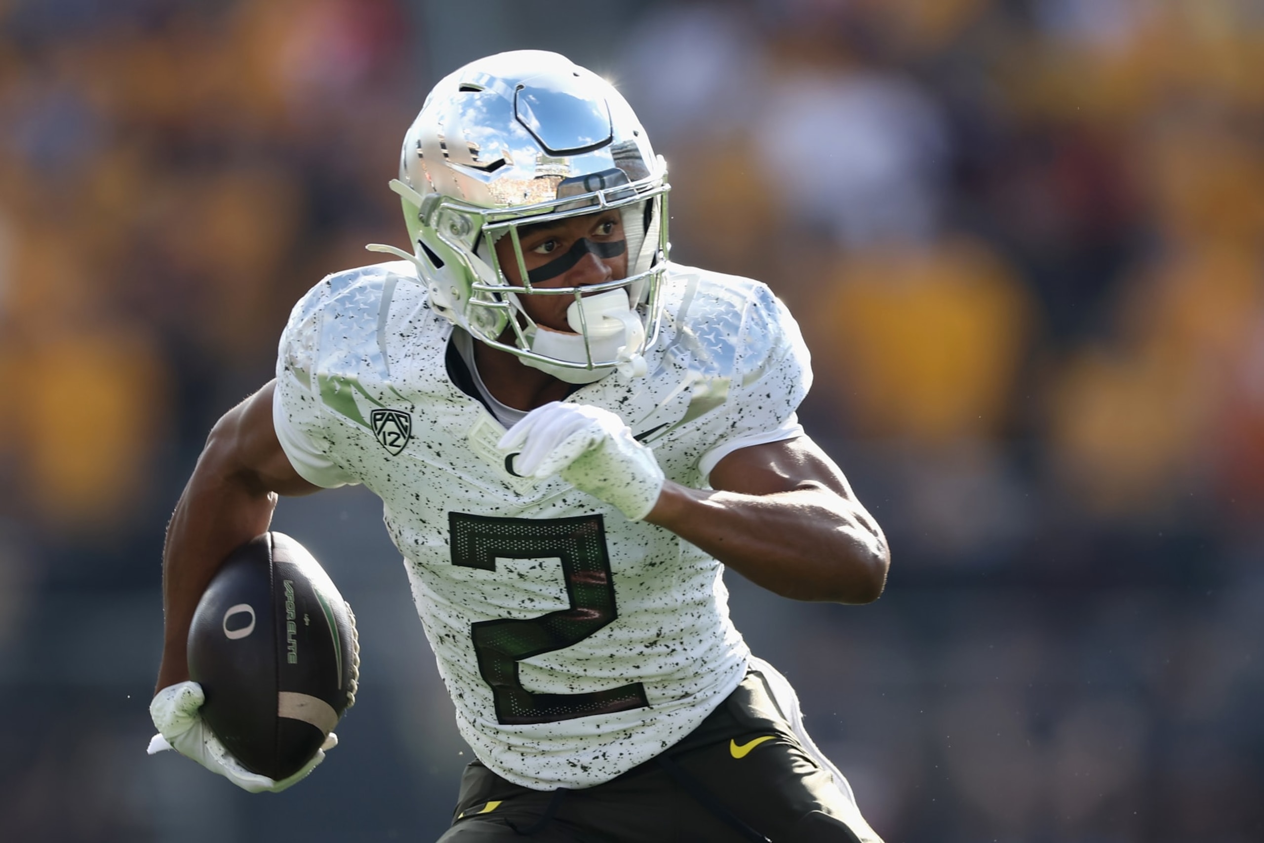 TEMPE, ARIZONA - NOVEMBER 18: Wide receiver Gary Bryant Jr. #2 of the Oregon Ducks runs with the football after a reception against the Arizona State Sun Devils during the first half of the NCAAF game at Mountain America Stadium on November 18, 2023 in Tempe, Arizona.  The Ducks defeated the Sun Devils 49-13. (Photo by Christian Petersen/Getty Images)