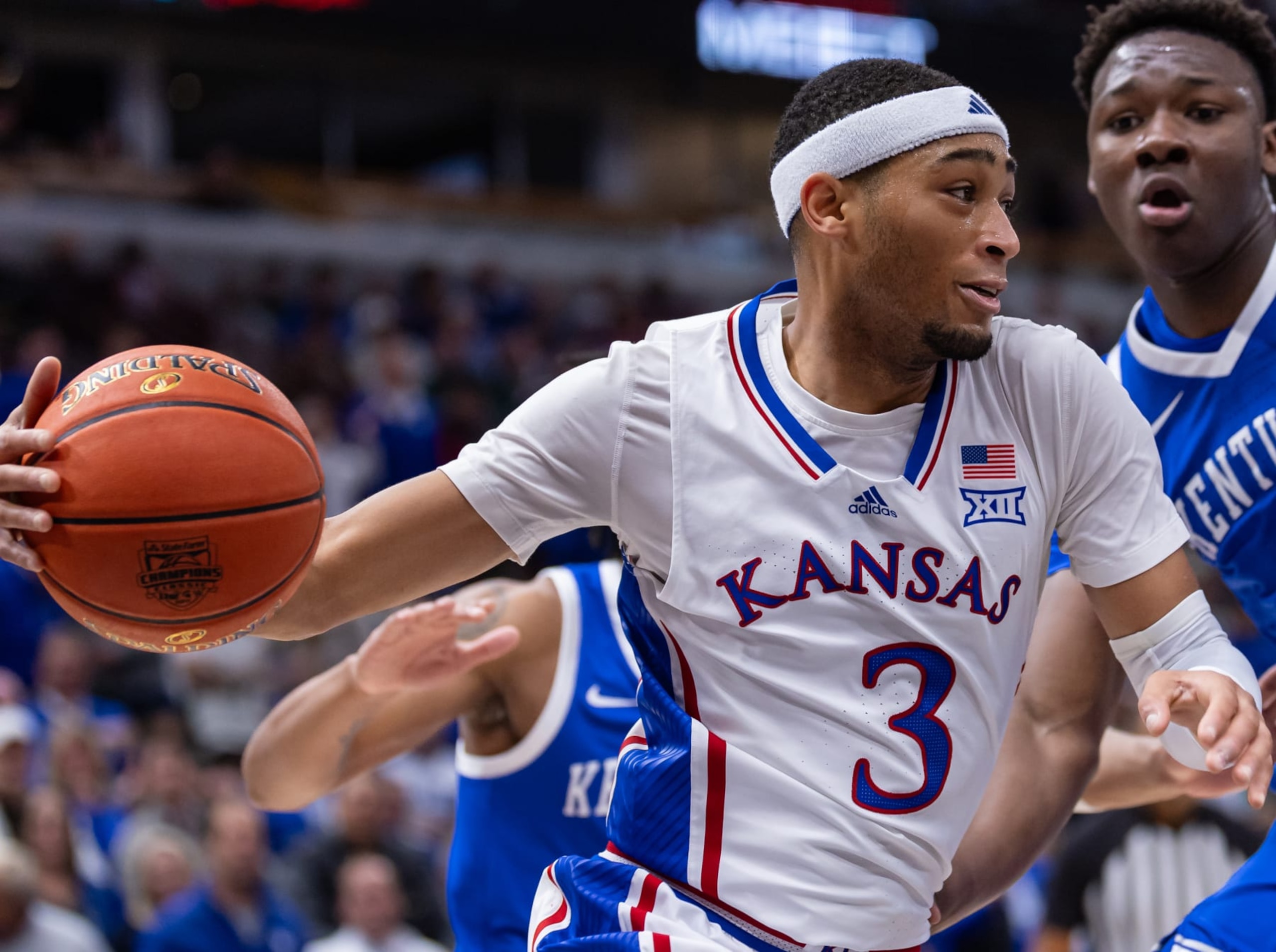 CHICAGO, ILLINOIS - NOVEMBER 14: Dajuan Harris Jr. #3 of the Kansas Jayhawks drives to the basket during the game against the Kentucky Wildcats in the Champions Classic at the United Center on November 14, 2023 in Chicago, Illinois. (Photo by Michael Hickey/Getty Images)