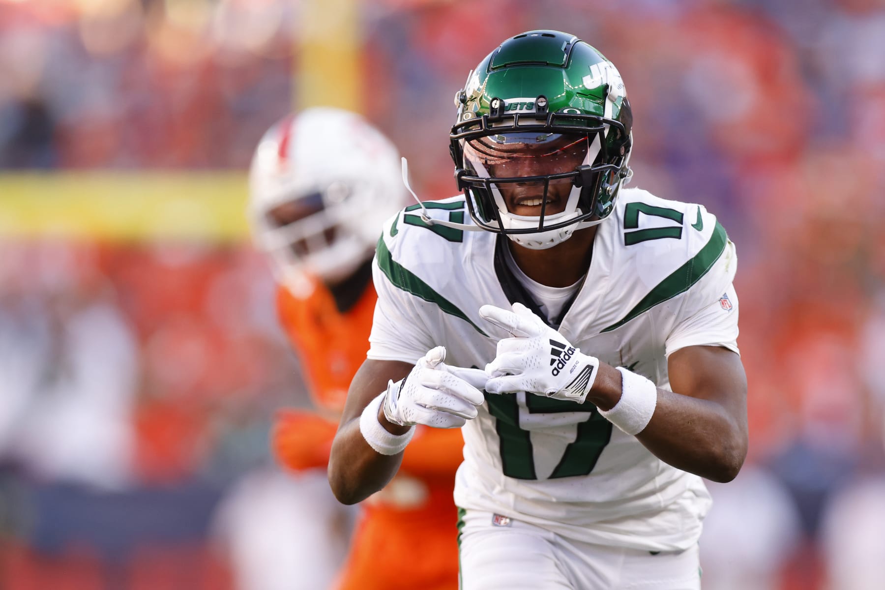DENVER, COLORADO - OCTOBER 08: Garrett Wilson #17 of the New York Jets celebrates after making a catch in the fourth quarter against the Denver Broncos at Empower Field At Mile High on October 08, 2023 in Denver, Colorado. (Photo by Justin Edmonds/Getty Images)