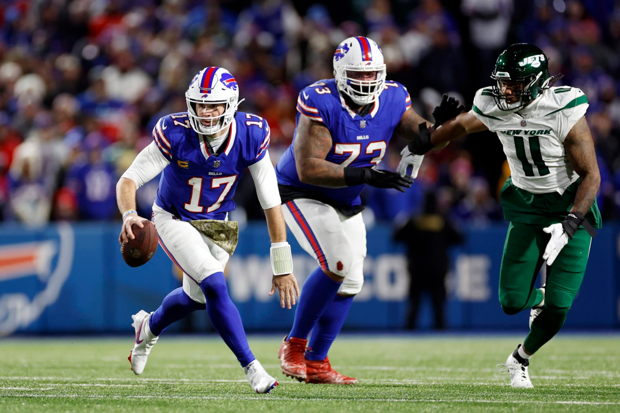 ORCHARD PARK, NEW YORK - NOVEMBER 19: Josh Allen #17 of the Buffalo Bills scrambles in the second quarter against the New York Jets at Highmark Stadium on November 19, 2023 in Orchard Park, New York. (Photo by Sarah Stier/Getty Images) ORCHARD PARK, NEW YORK - NOVEMBER 19: Josh Allen #17 of the Buffalo Bills scrambles in the second quarter against the New York Jets at Highmark Stadium on November 19, 2023 in Orchard Park, New York. (Photo by Sarah Stier/Getty Images)