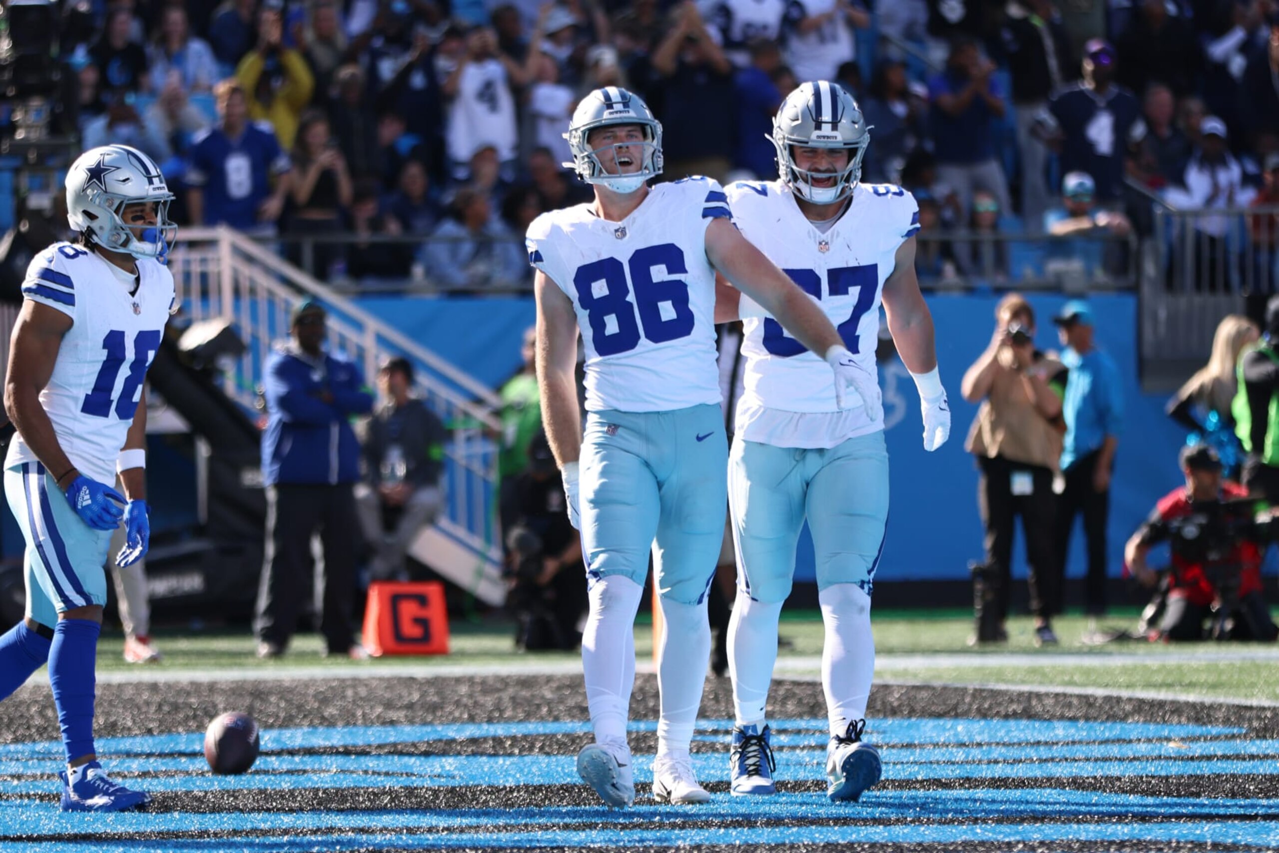 CHARLOTTE, NORTH CAROLINA - NOVEMBER 19: Luke Schoonmaker #86 of the Dallas Cowboys celebrates after a touchdown in the game against the Carolina Panthers during the first quarter at Bank of America Stadium on November 19, 2023 in Charlotte, North Carolina. (Photo by David Jensen/Getty Images) CHARLOTTE, NORTH CAROLINA - NOVEMBER 19: Luke Schoonmaker #86 of the Dallas Cowboys celebrates after a touchdown in the game against the Carolina Panthers during the first quarter at Bank of America Stadium on November 19, 2023 in Charlotte, North Carolina. (Photo by David Jensen/Getty Images)