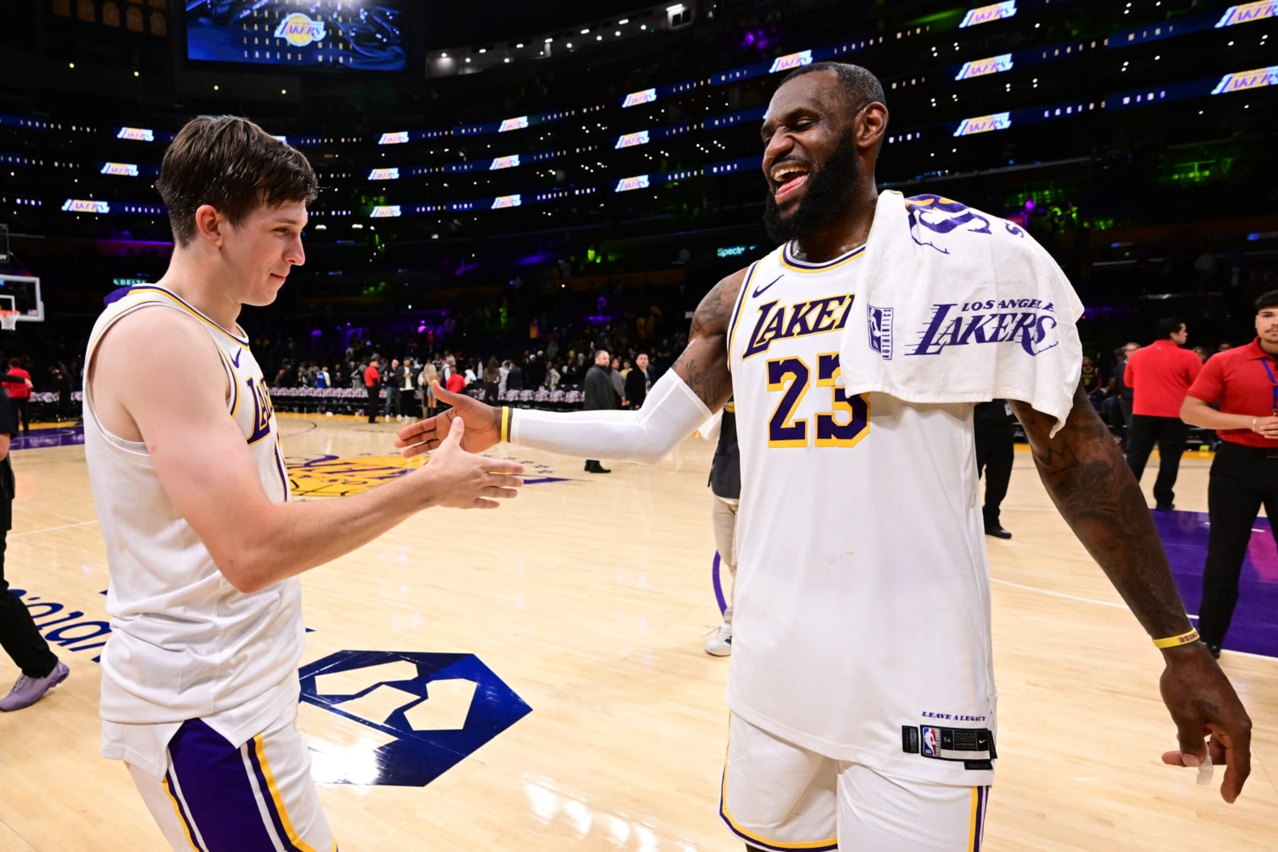 LOS ANGELES, CA - NOVEMBER 19: Austin Reaves #15 and LeBron James #23 of the Los Angeles Lakers celebrate after the game against the Houston Rockets on November 19, 2023 at Crypto.Com Arena in Los Angeles, California. NOTE TO USER: User expressly acknowledges and agrees that, by downloading and/or using this Photograph, user is consenting to the terms and conditions of the Getty Images License Agreement. Mandatory Copyright Notice: Copyright 2023 NBAE (Photo by Adam Pantozzi/NBAE via Getty Images)