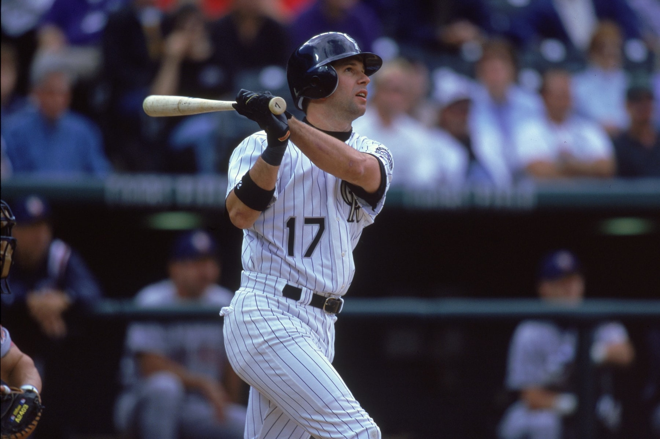 21 Sep 2000:  Todd Helton #17 of the Colorado Rockies watches the ball after hitting it during the game against the San Diego Padres at Coors Field in Denver, Colorado. The Rockies defeated the Padres 13-4.Mandatory Credit: Brian Bahr  /Allsport