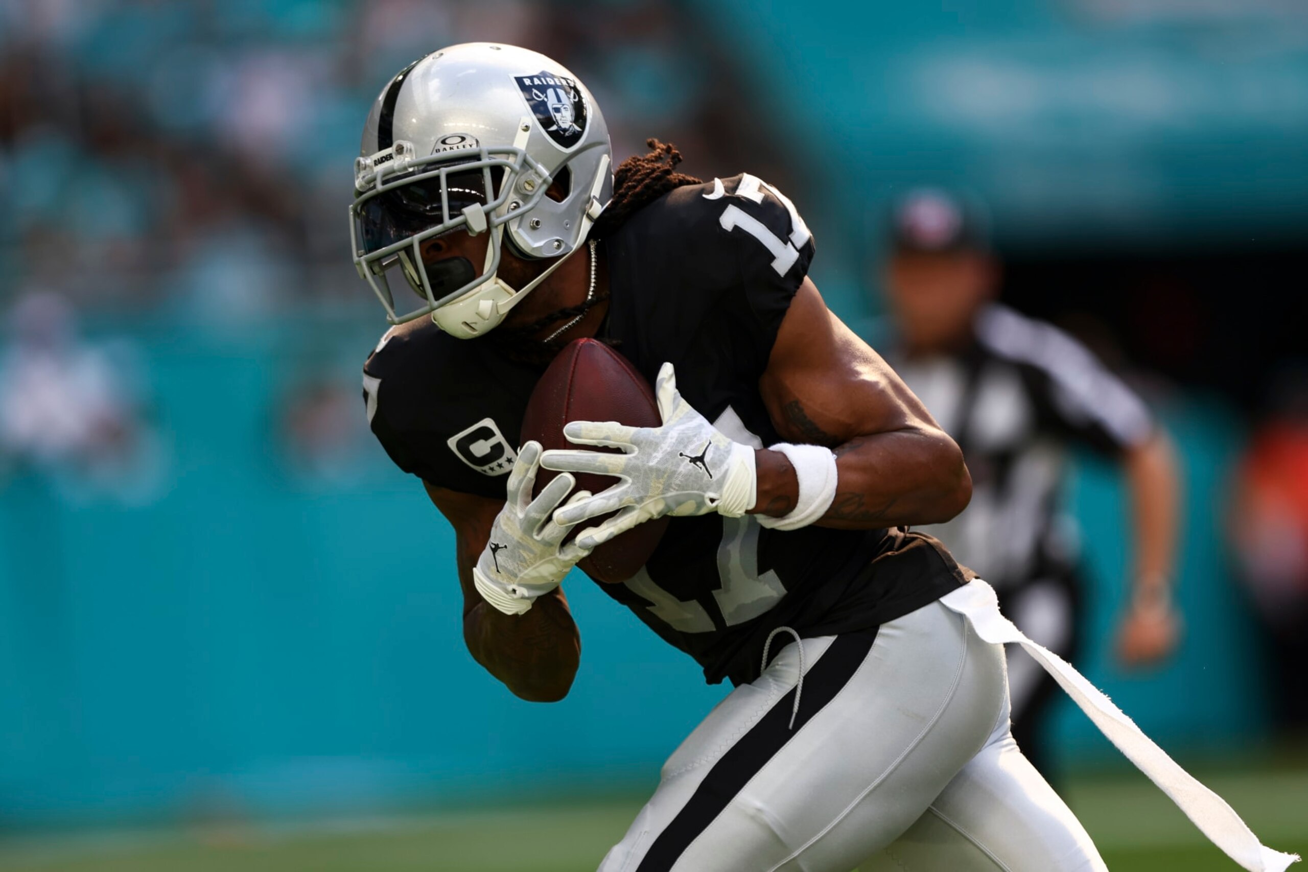 MIAMI GARDENS, FL - NOVEMBER 19: Davante Adams #17 of the Las Vegas Raiders catches a pass to score a touchdown during the first quarter of an NFL football game against the Miami Dolphins at Hard Rock Stadium on November 19, 2023 in Miami Gardens, Florida. (Photo by Kevin Sabitus/Getty Images)