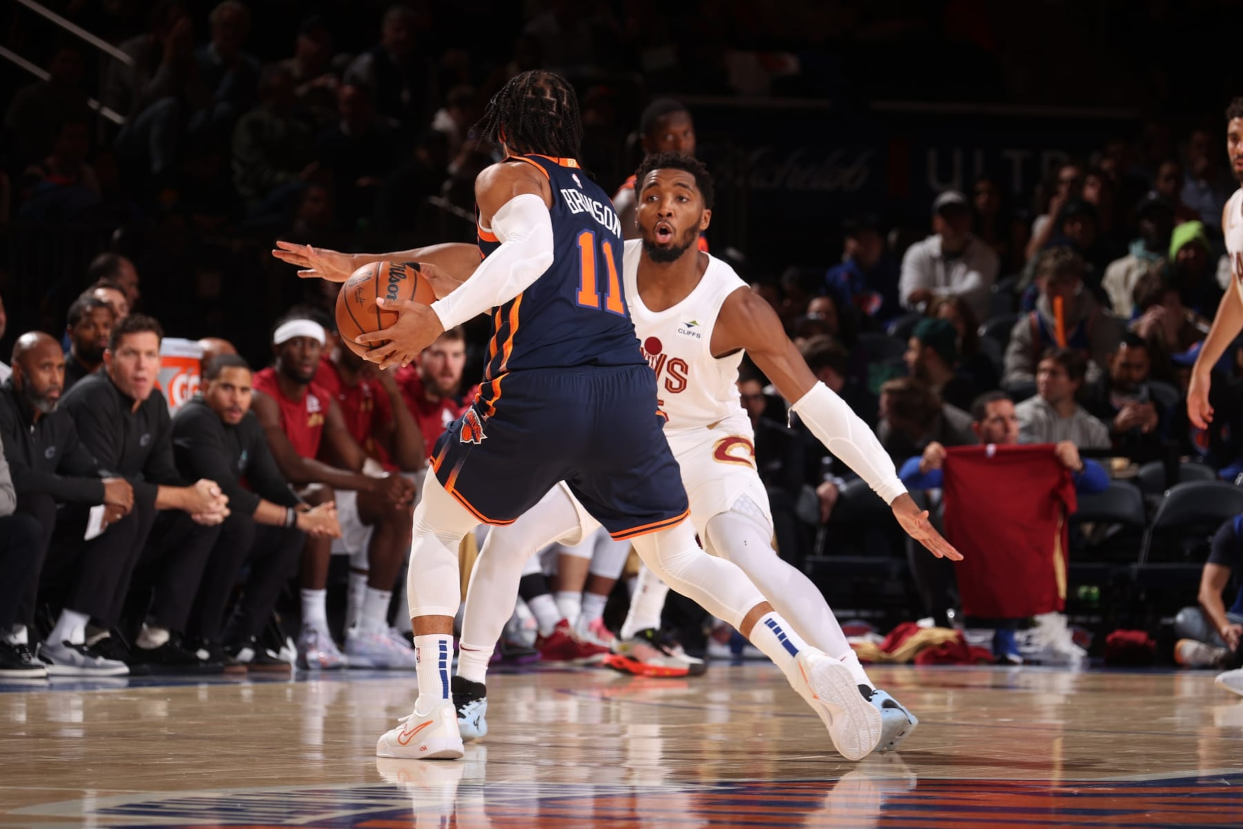 NEW YORK, NY - NOVEMBER 1: Jalen Brunson #11 of the New York Knicks handles the ball against defender Donovan Mitchell #45 of the Cleveland Cavaliers during the game on November 1, 2023 at Madison Square Garden in New York City, New York. NOTE TO USER: User expressly acknowledges and agrees that, by downloading and or using this photograph, User is consenting to the terms and conditions of the Getty Images License Agreement. Mandatory Copyright Notice: Copyright 2023 NBAE (Photo by Nathaniel S. Butler/NBAE via Getty Images) NEW YORK, NY - NOVEMBER 1: Jalen Brunson #11 of the New York Knicks handles the ball against defender Donovan Mitchell #45 of the Cleveland Cavaliers during the game on November 1, 2023 at Madison Square Garden in New York City, New York. NOTE TO USER: User expressly acknowledges and agrees that, by downloading and or using this photograph, User is consenting to the terms and conditions of the Getty Images License Agreement. Mandatory Copyright Notice: Copyright 2023 NBAE (Photo by Nathaniel S. Butler/NBAE via Getty Images)
