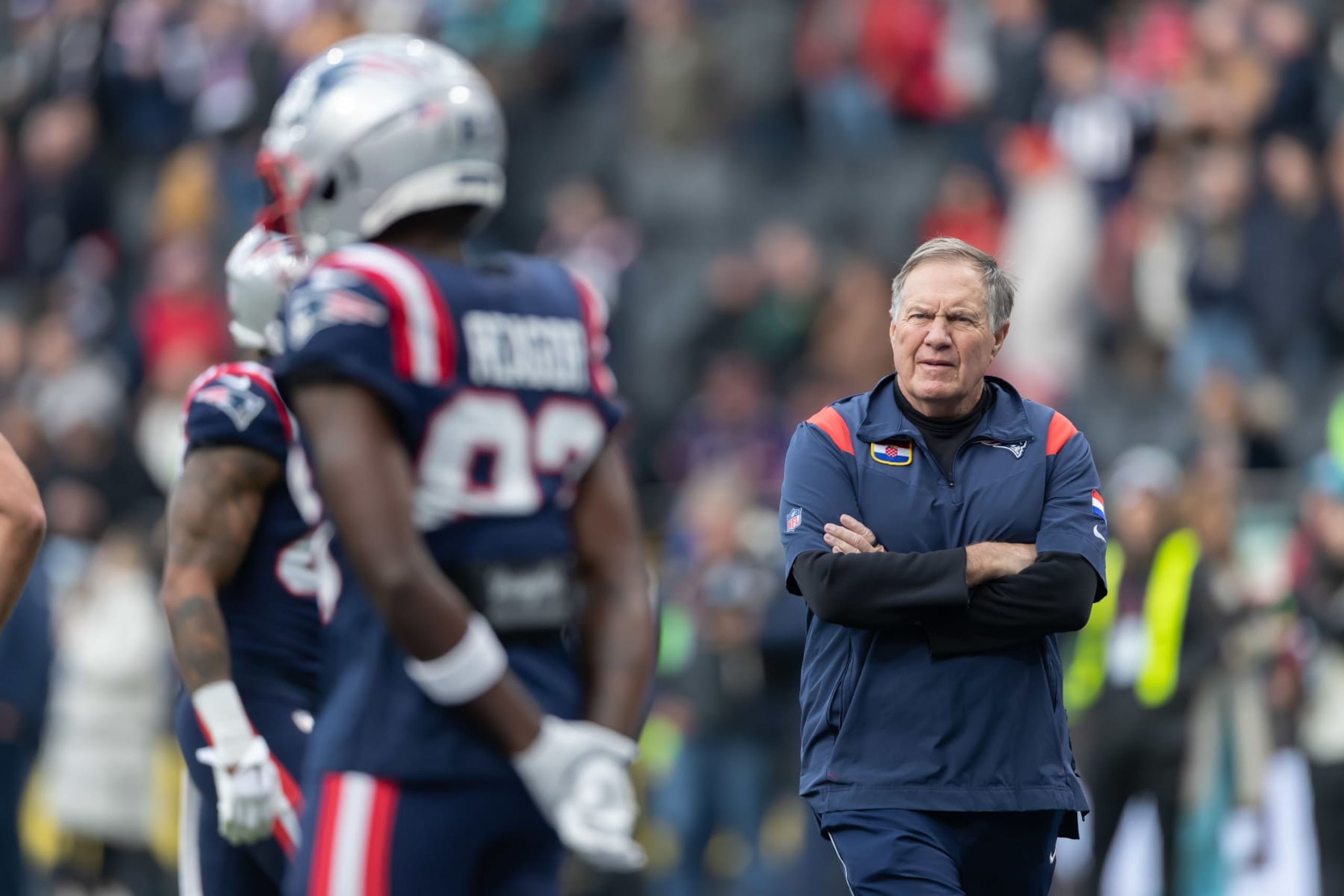 FRANKFURT AM MAIN, GERMANY - NOVEMBER 12: Head Coach Bill Belichick of New England Patriots looks on prior to the NFL match between Indianapolis Colts and New England Patriots at Deutsche Bank Park on November 12, 2023 in Frankfurt am Main, Germany. (Photo by Mario Hommes/DeFodi Images via Getty Images) FRANKFURT AM MAIN, GERMANY - NOVEMBER 12: Head Coach Bill Belichick of New England Patriots looks on prior to the NFL match between Indianapolis Colts and New England Patriots at Deutsche Bank Park on November 12, 2023 in Frankfurt am Main, Germany. (Photo by Mario Hommes/DeFodi Images via Getty Images)