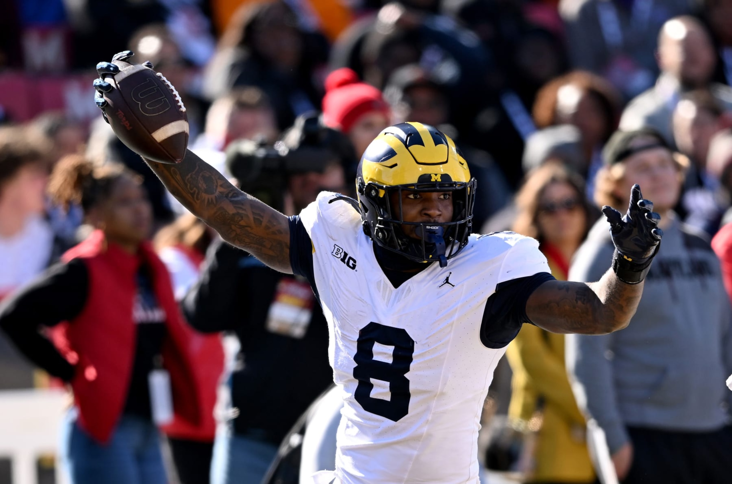 COLLEGE PARK, MARYLAND - NOVEMBER 18: Derrick Moore #8 of the Michigan Wolverines celebrates after returning a fumble for a touchdown in the first quarter against the Maryland Terrapins at SECU Stadium on November 18, 2023 in College Park, Maryland. (Photo by Greg Fiume/Getty Images) COLLEGE PARK, MARYLAND - NOVEMBER 18: Derrick Moore #8 of the Michigan Wolverines celebrates after returning a fumble for a touchdown in the first quarter against the Maryland Terrapins at SECU Stadium on November 18, 2023 in College Park, Maryland. (Photo by Greg Fiume/Getty Images)