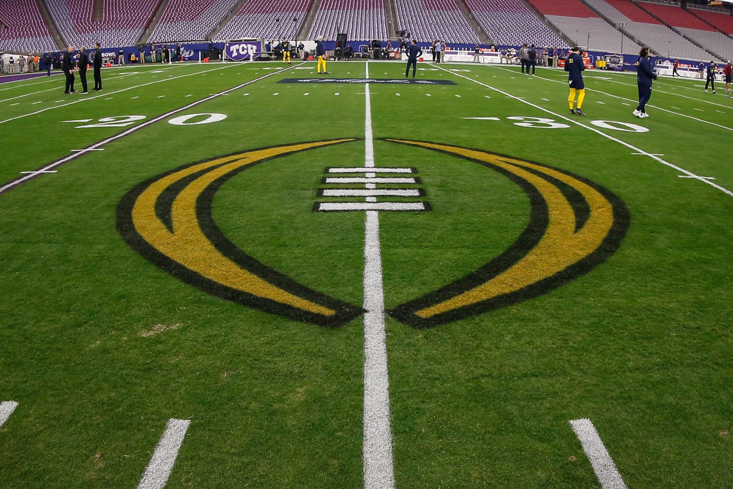 GLENDALE, AZ - DECEMBER 31: The College Football Playoff logo on the field before the VRBO Fiesta Bowl college football national championship semifinal game between the Michigan Wolverines and the TCU Horned Frogs on December 31, 2022 at State Farm Stadium in Glendale, Arizona. (Photo by Kevin Abele/Icon Sportswire via Getty Images) GLENDALE, AZ - DECEMBER 31: The College Football Playoff logo on the field before the VRBO Fiesta Bowl college football national championship semifinal game between the Michigan Wolverines and the TCU Horned Frogs on December 31, 2022 at State Farm Stadium in Glendale, Arizona. (Photo by Kevin Abele/Icon Sportswire via Getty Images)