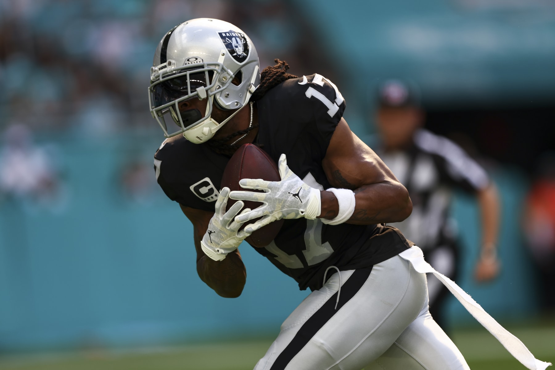 MIAMI GARDENS, FL - NOVEMBER 19: Davante Adams #17 of the Las Vegas Raiders catches a pass to score a touchdown during the first quarter of an NFL football game against the Miami Dolphins at Hard Rock Stadium on November 19, 2023 in Miami Gardens, Florida. (Photo by Kevin Sabitus/Getty Images)