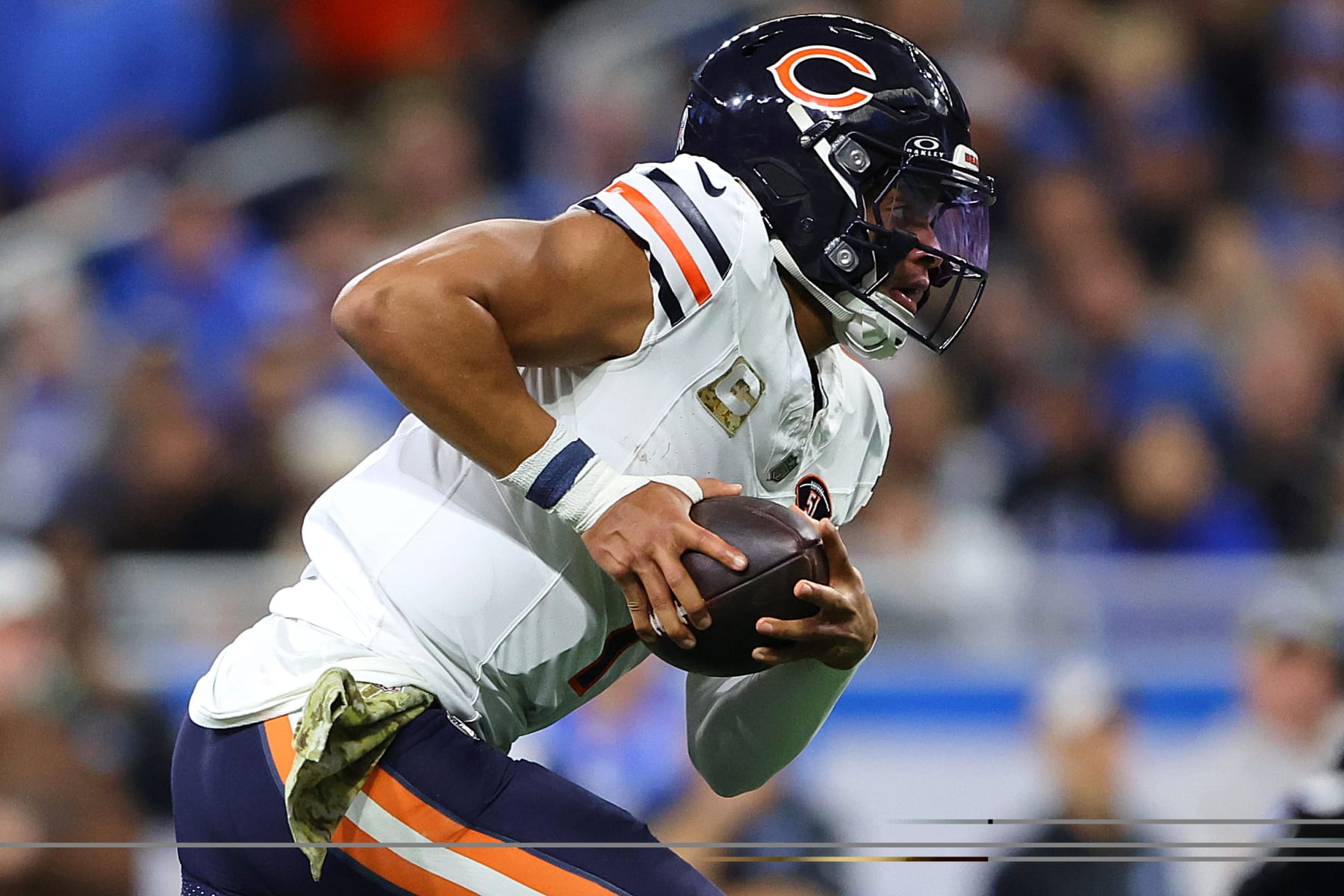 DETROIT, MICHIGAN - NOVEMBER 19: Justin Fields #1 of the Chicago Bears runs with the ball during the first quarter against the Detroit Lions at Ford Field on November 19, 2023 in Detroit, Michigan. (Photo by Rey Del Rio/Getty Images)