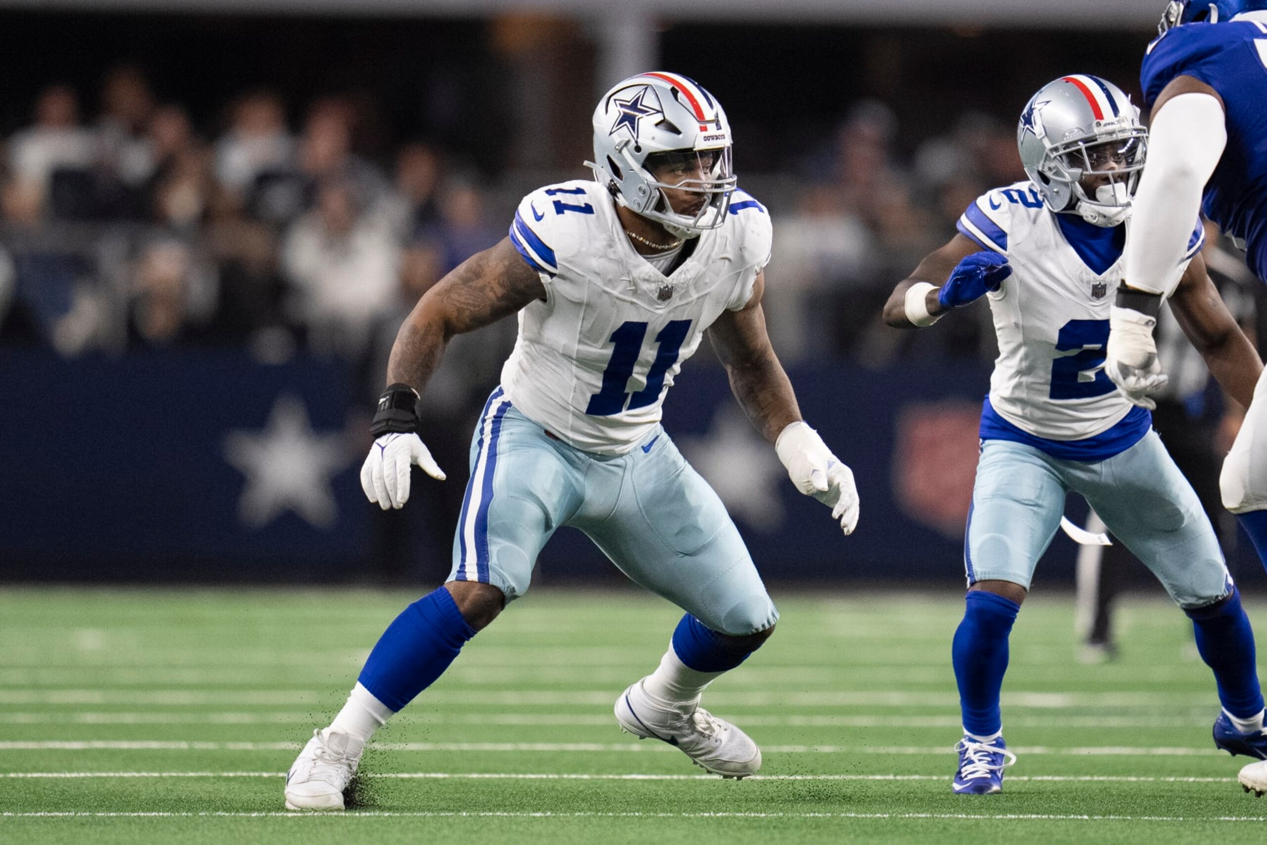 Dallas Cowboys linebacker Micah Parsons (11) rushes in during the second half of an NFL football game between the Dallas Cowboys and the New York Giants, Sunday, Nov. 12, 2023, in Arlington, Texas. The Cowboys won 49-17. (AP Photo/Julio Cortez)