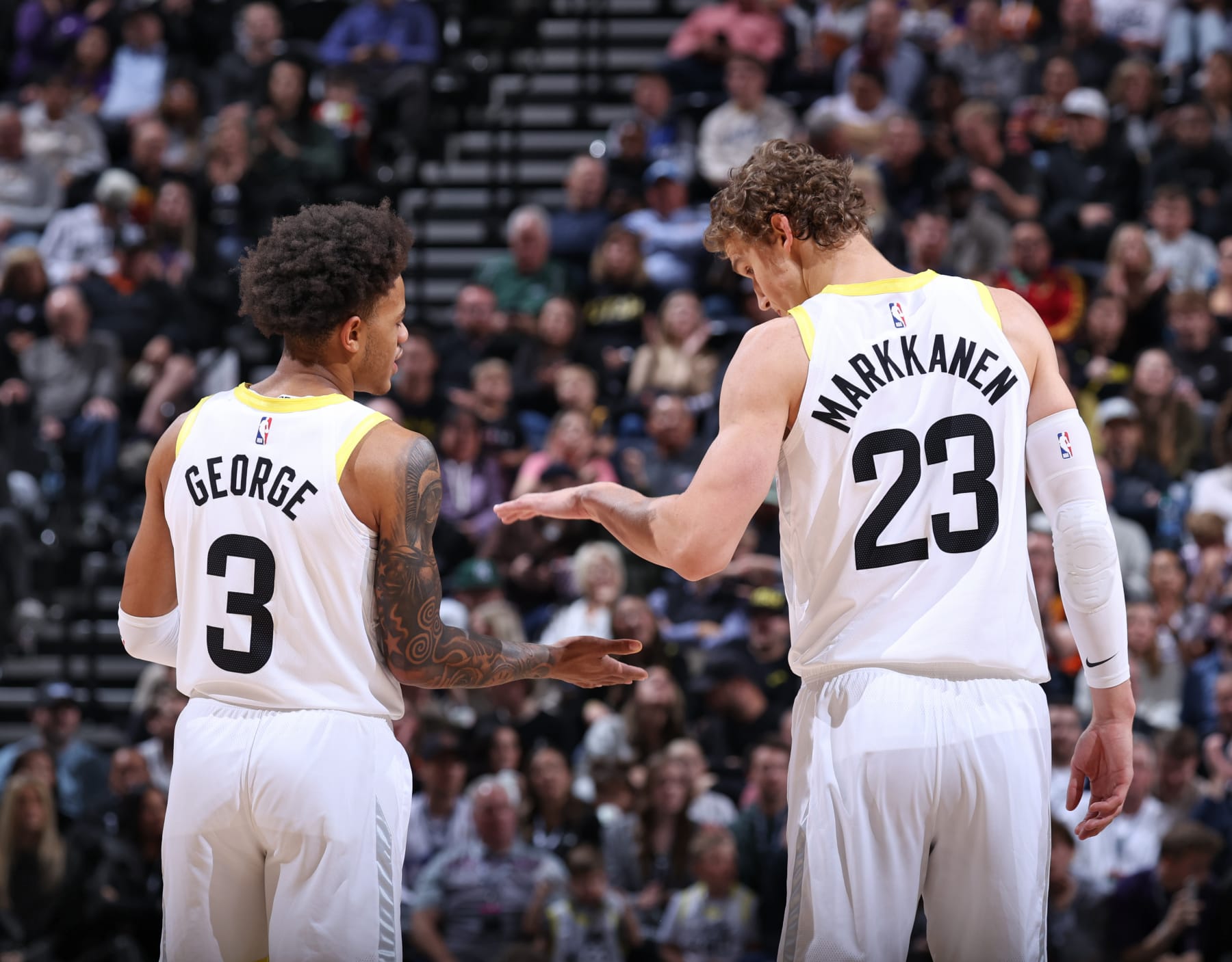 SALT LAKE CITY, UT - NOVEMBER 2: Lauri Markkanen #23 high fives Keyonte George #3 of the Utah Jazz during the game against the Orlando Magic on November 2, 2023 at Delta Center in Salt Lake City, Utah. NOTE TO USER: User expressly acknowledges and agrees that, by downloading and or using this Photograph, User is consenting to the terms and conditions of the Getty Images License Agreement. Mandatory Copyright Notice: Copyright 2023 NBAE (Photo by Melissa Majchrzak/NBAE via Getty Images)