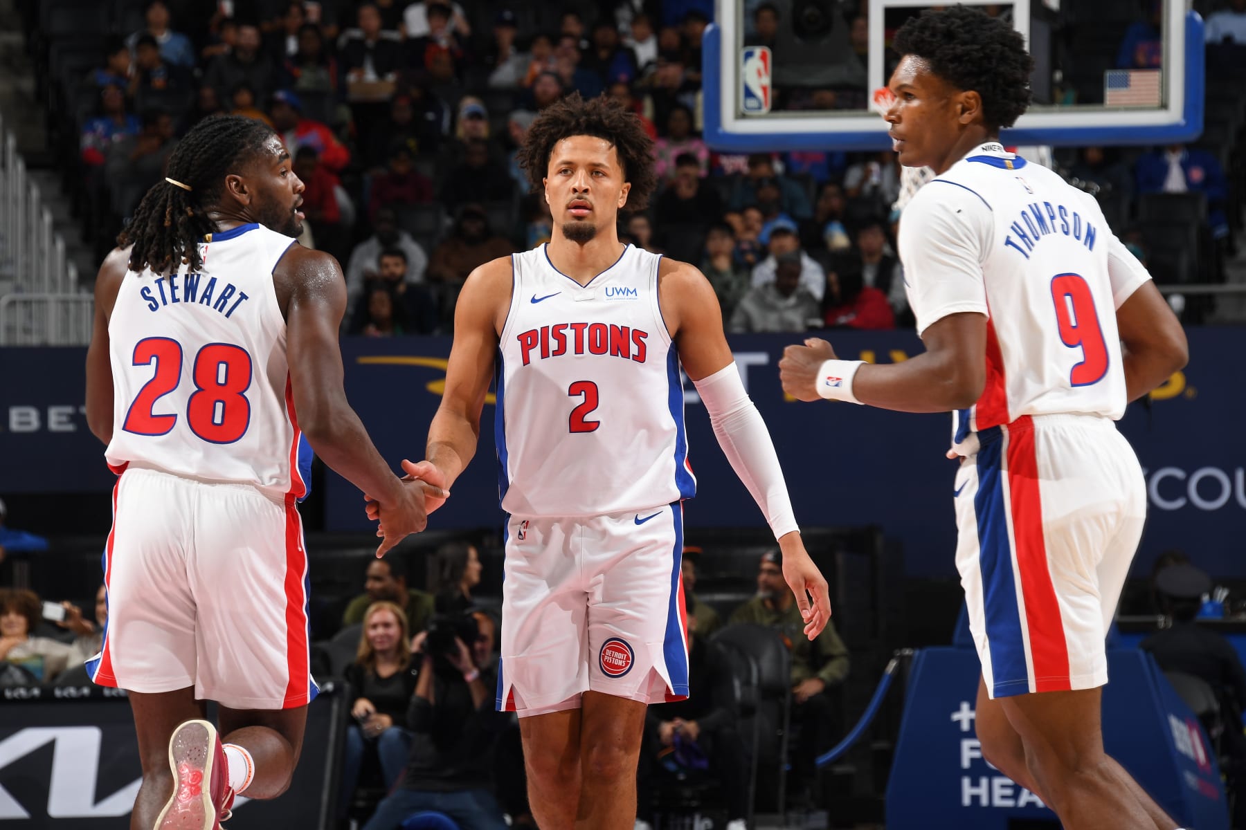 DETROIT, MI - OCTOBER 8: Cade Cunningham #2 and Isaiah Stewart #28 of the Detroit Pistons high five during the game against the Phoenix Suns on October 8, 2023 at Little Caesars Arena in Detroit, Michigan. NOTE TO USER: User expressly acknowledges and agrees that, by downloading and/or using this photograph, User is consenting to the terms and conditions of the Getty Images License Agreement. Mandatory Copyright Notice: Copyright 2023 NBAE (Photo by Chris Schwegler/NBAE via Getty Images)