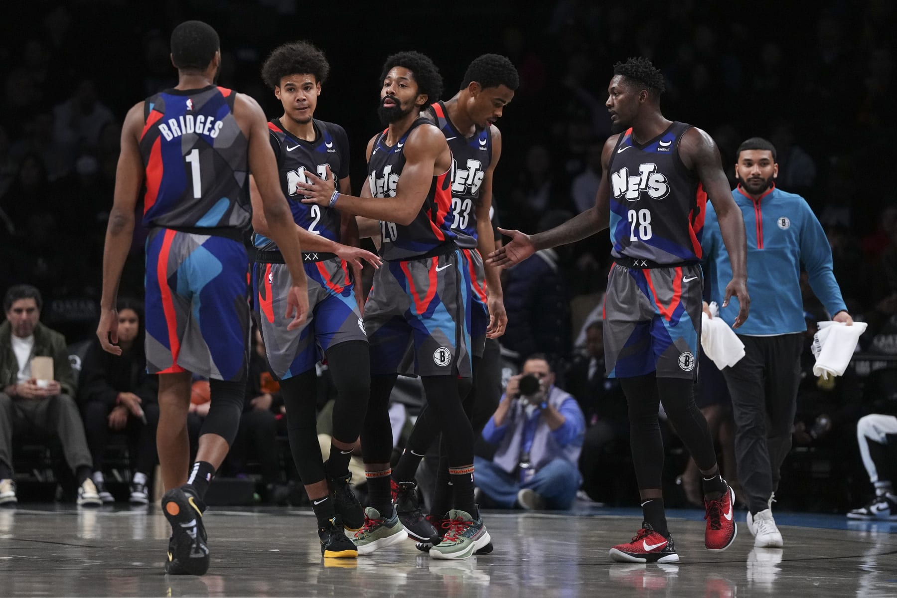 NEW YORK, NEW YORK - NOVEMBER 12: Mikal Bridges #1, Cameron Johnson #2, Spencer Dinwiddie #26, Nic Claxton #33, and Dorian Finney-Smith #28 of the Brooklyn Nets react against the Washington Wizards at Barclays Center on November 12, 2023 in the Brooklyn borough of New York City. The Nets defeated the Wizards 102-94. NOTE TO USER: User expressly acknowledges and agrees that, by downloading and or using this photograph, User is consenting to the terms and conditions of the Getty Images License Agreement. (Photo by Mitchell Leff/Getty Images)