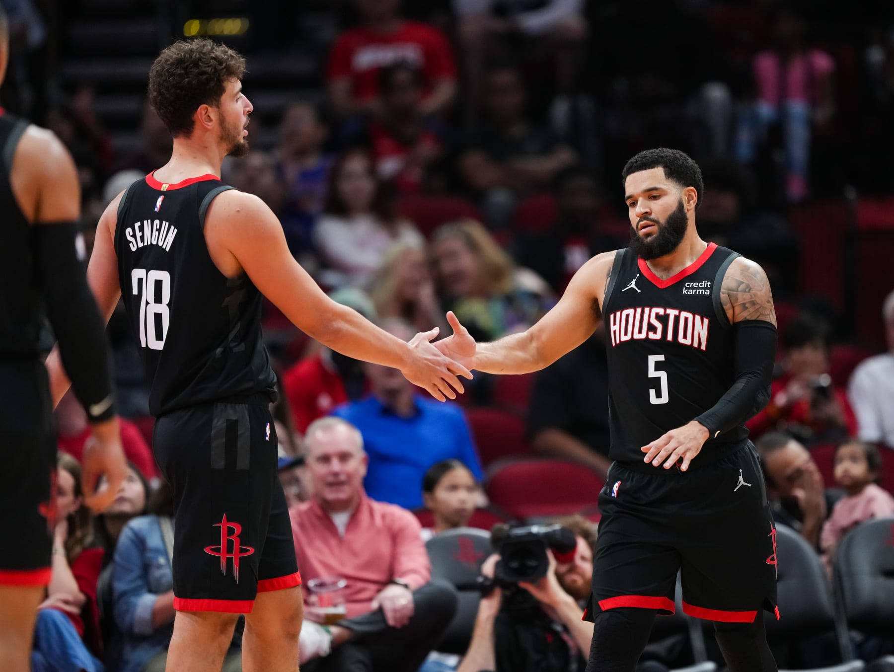 HOUSTON, TEXAS - NOVEMBER 04: Fred VanVleet #5 of the Houston Rockets hi fives Alperen Sengun #28 of the Houston Rockets after making a shot in the first quarter of the game against the Sacramento Kings at Toyota Center on November 04, 2023 in Houston, Texas. NOTE TO USER: User expressly acknowledges and agrees that, by downloading and or using this photograph, User is consenting to the terms and conditions of the Getty Images License Agreement. (Photo by Alex Bierens de Haan/Getty Images)