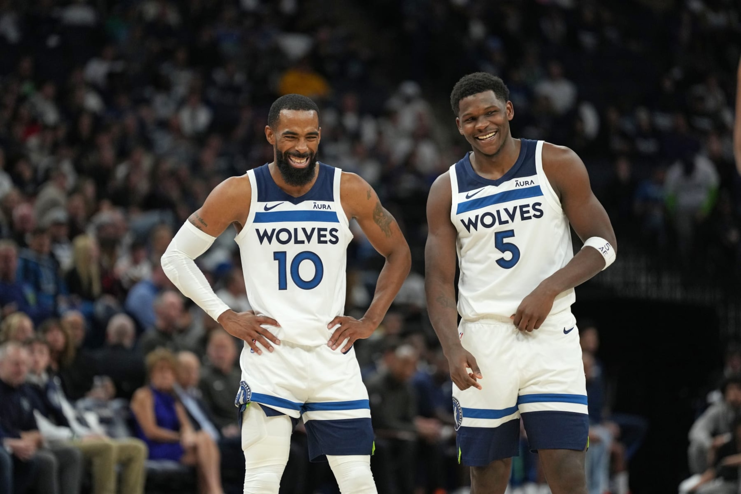 MINNEAPOLIS, MN - OCTOBER 28: Mike Conley #10 of the Minnesota Timberwolves and Anthony Edwards #5 of the Minnesota Timberwolves smile during the game against the Miami Heat on October 28, 2023 at Target Center in Minneapolis, Minnesota. NOTE TO USER: User expressly acknowledges and agrees that, by downloading and or using this Photograph, user is consenting to the terms and conditions of the Getty Images License Agreement. Mandatory Copyright Notice: Copyright 2023 NBAE (Photo by Jordan Johnson/NBAE via Getty Images) MINNEAPOLIS, MN - OCTOBER 28: Mike Conley #10 of the Minnesota Timberwolves and Anthony Edwards #5 of the Minnesota Timberwolves smile during the game against the Miami Heat on October 28, 2023 at Target Center in Minneapolis, Minnesota. NOTE TO USER: User expressly acknowledges and agrees that, by downloading and or using this Photograph, user is consenting to the terms and conditions of the Getty Images License Agreement. Mandatory Copyright Notice: Copyright 2023 NBAE (Photo by Jordan Johnson/NBAE via Getty Images)