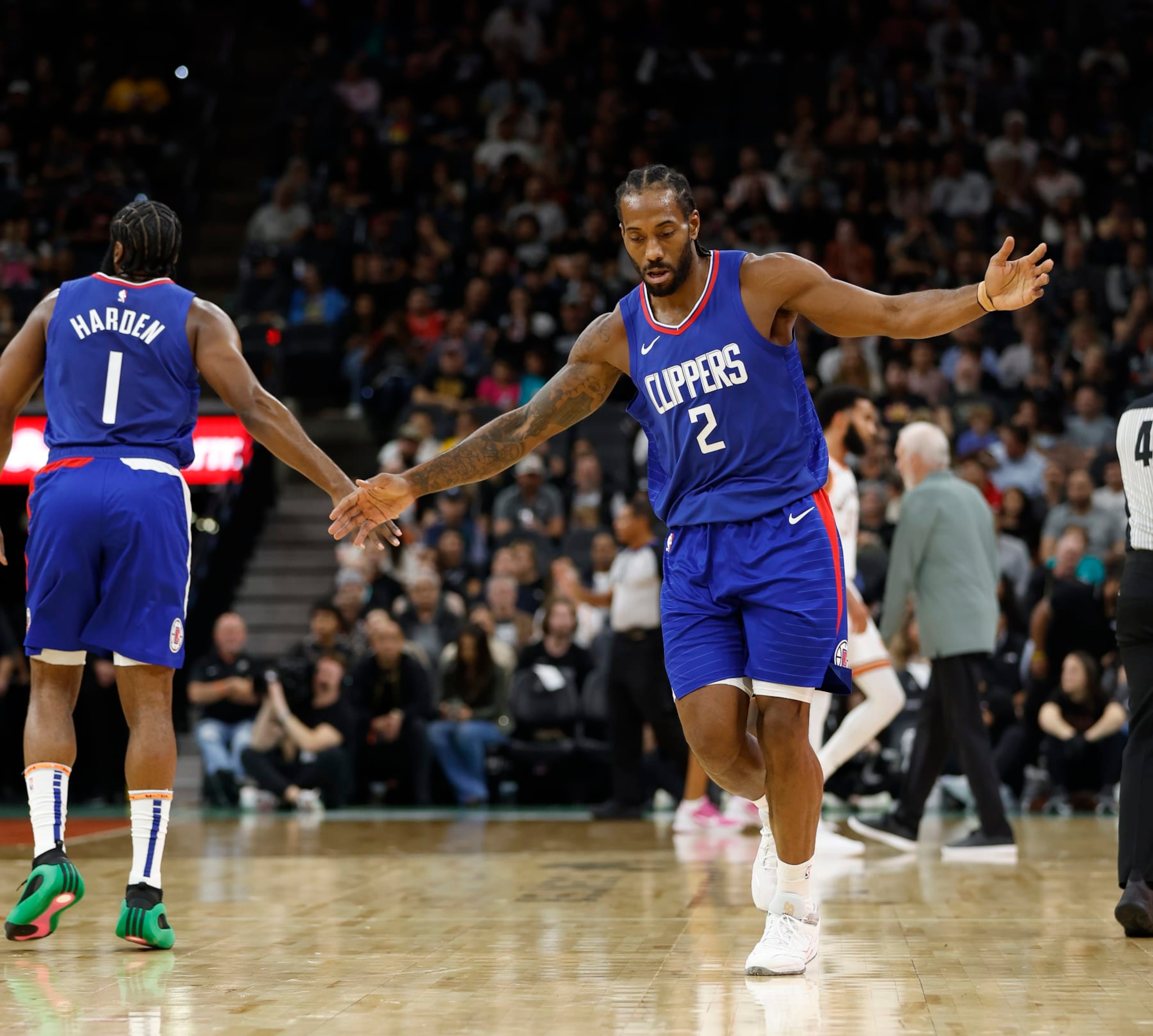 SAN ANTONIO, TX - NOVEMBER 20:   Kawhi Leonard #2 of the Los Angeles Clippers is congratulated by James Harden #1 after hitting a basket against the San Antonio Spurs in the first half at Frost Bank Center on November  20, 2023 in San Antonio, Texas. NOTE TO USER: User expressly acknowledges and agrees that, by downloading and or using this photograph, User is consenting to terms and conditions of the Getty Images License Agreement. (Photo by Ronald Cortes/Getty Images)