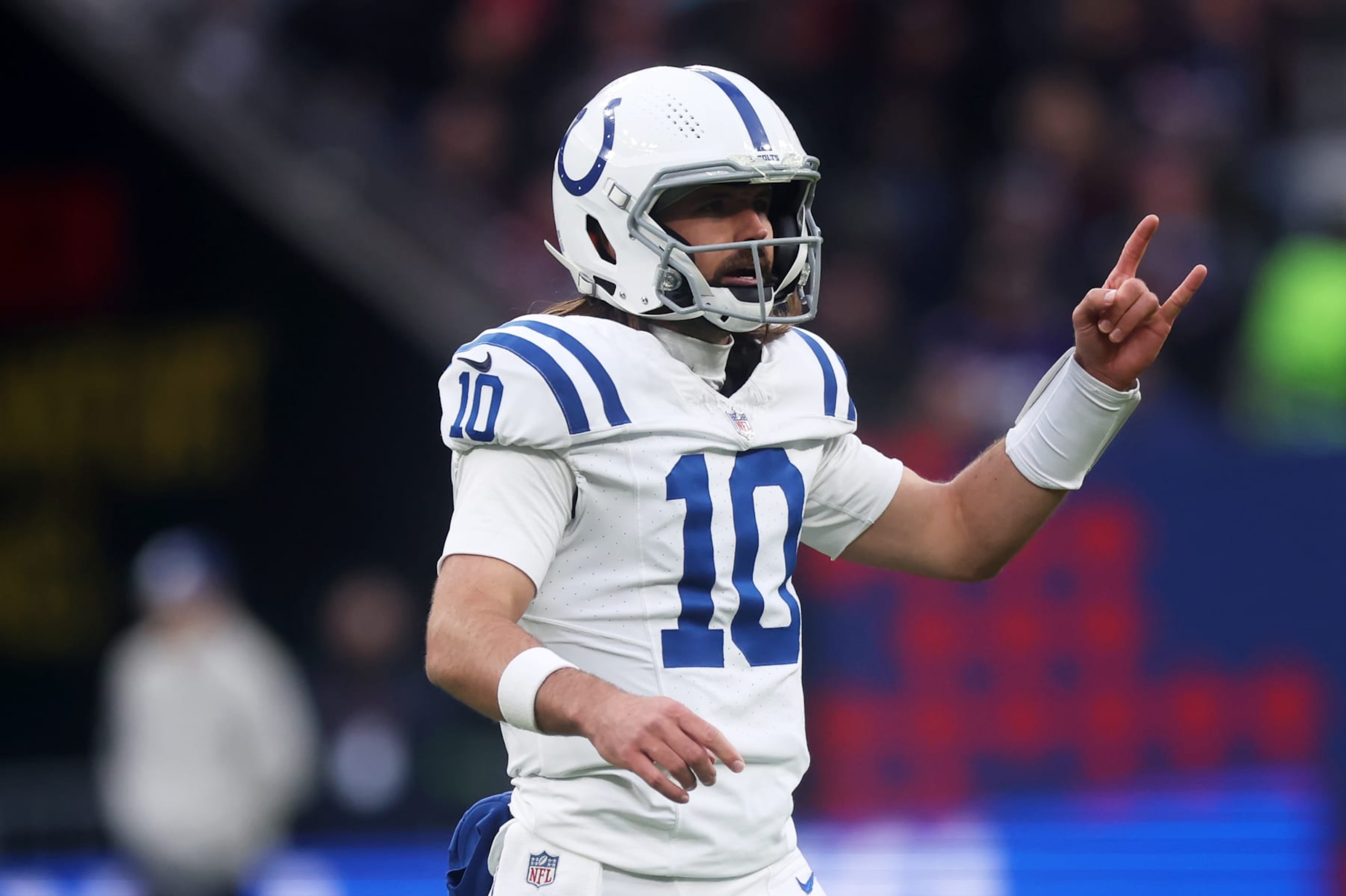 FRANKFURT AM MAIN, GERMANY - NOVEMBER 12: Gardner Minshew #10 of the Indianapolis Colts gives the team instructions d1qduring the NFL match between the Indianapolis Colts and the New England Patriots at Deutsche Bank Park on November 12, 2023 in Frankfurt am Main, Germany. (Photo by Alex Grimm/Getty Images)