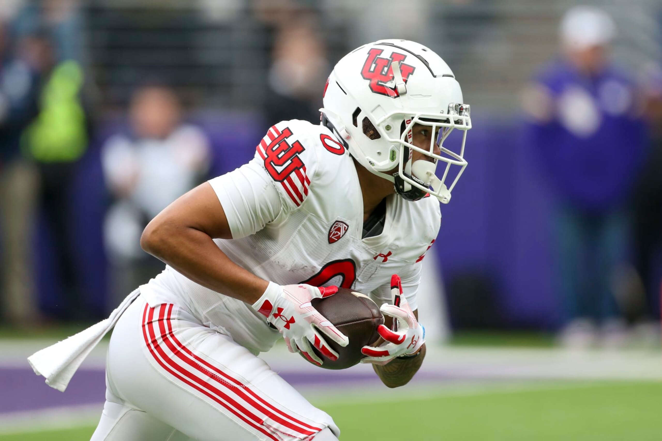 SEATTLE, WA - NOVEMBER 11:  Utah #0 (KOR) Money Parks during a college football game between the Washington Huskies and the Utah Utes on November 11, 2023, at Husky Stadium in Seattle, WA. (Photo by Jesse Beals/Icon Sportswire via Getty Images)