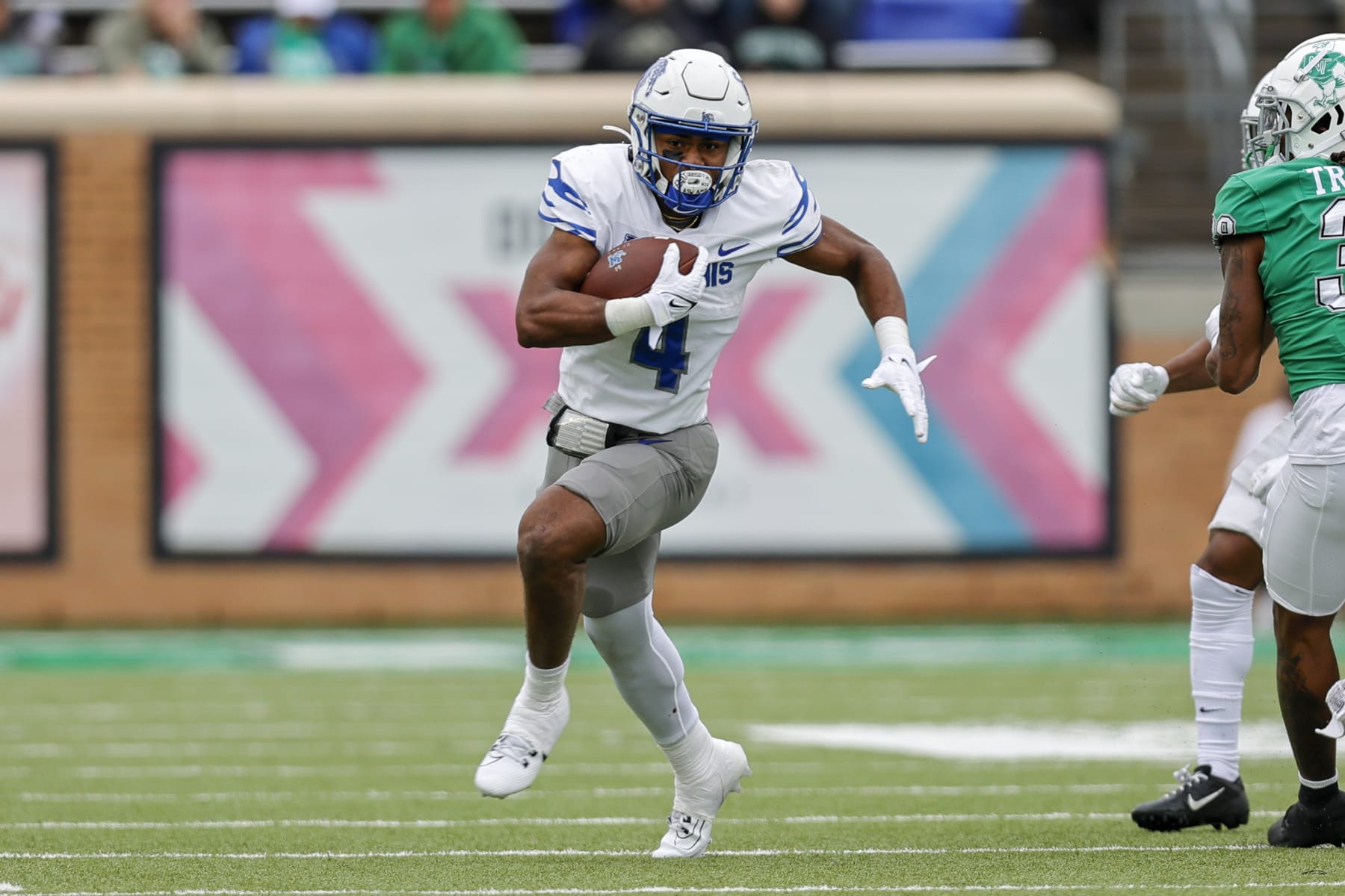 DENTON, TX - OCTOBER 28: Memphis Tigers running back Blake Watson (4) runs through the line of scrimmage during the game between the North Texas Mean Green and the Memphis Tigers on October 28, 2023 at DATCU Stadium in Denton, Texas. (Photo by Matthew Pearce/Icon Sportswire via Getty Images)