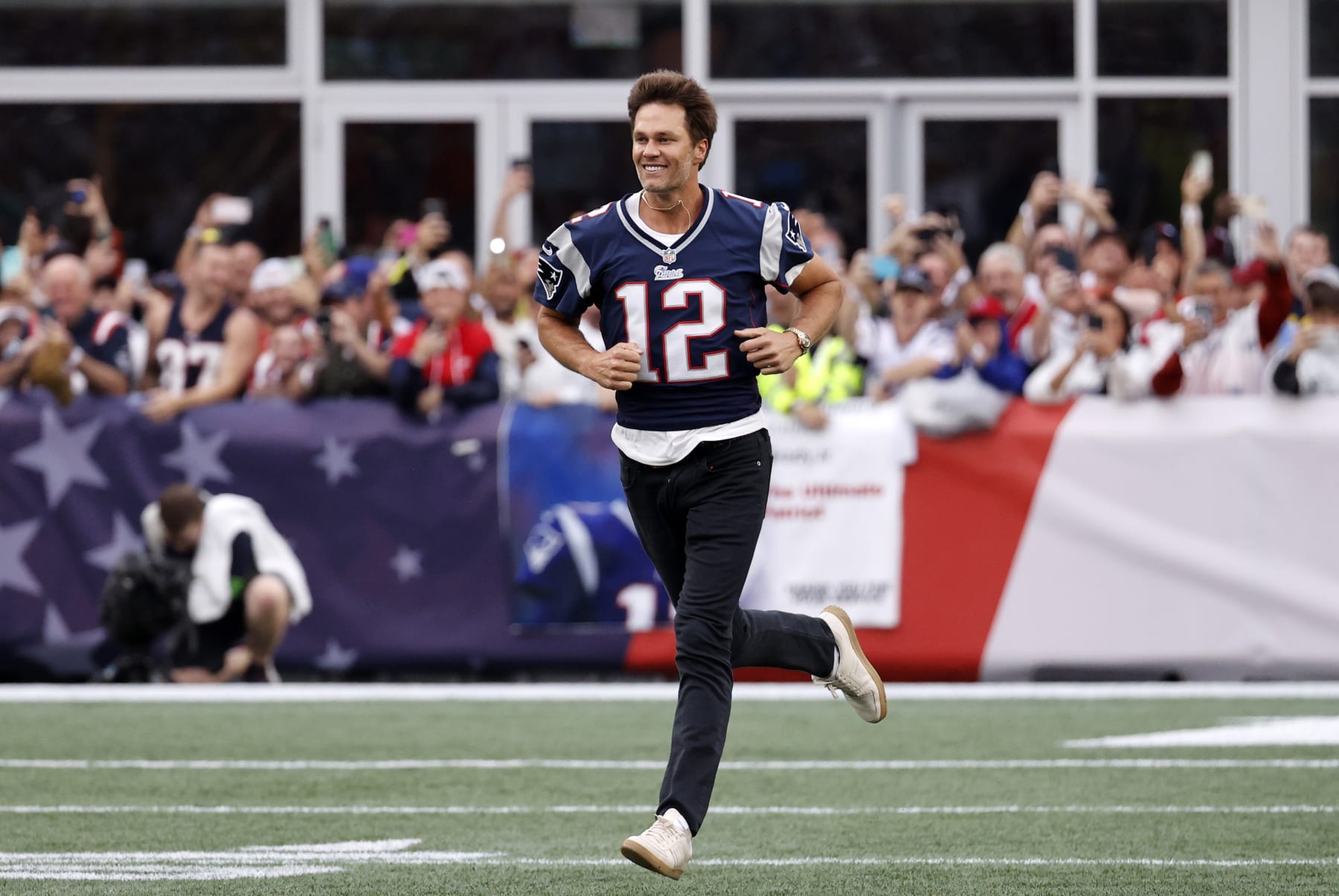 FOXBOROUGH, MA - SEPTEMBER 10: Tom Brady races across the turf during a game between the New England Patriots and the Philadelphia Eagles on September 10, 2023, at Gillette Stadium in Foxborough, Massachusetts. (Photo by Fred Kfoury III/Icon Sportswire via Getty Images)
