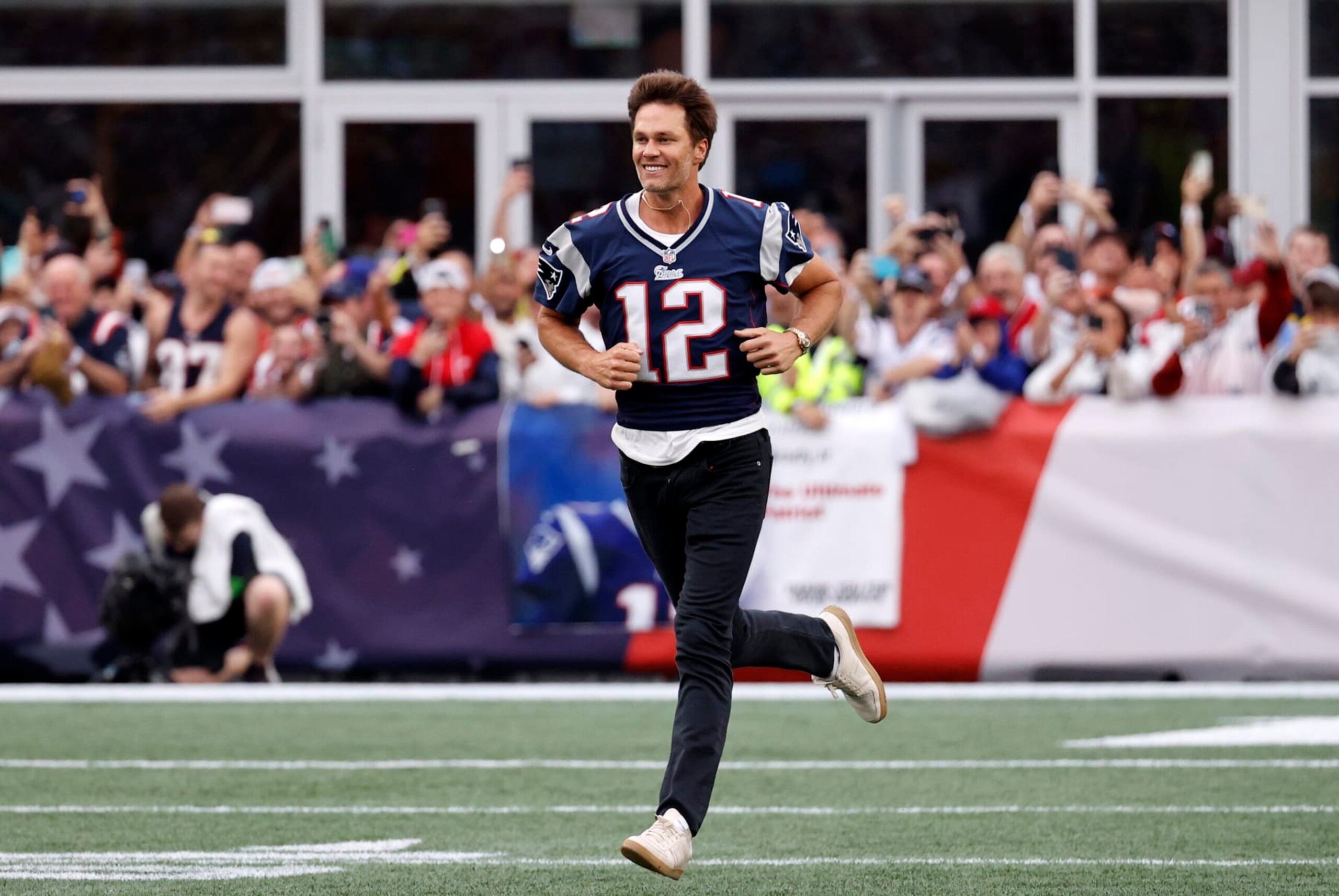 FOXBOROUGH, MA - SEPTEMBER 10: Tom Brady races across the turf during a game between the New England Patriots and the Philadelphia Eagles on September 10, 2023, at Gillette Stadium in Foxborough, Massachusetts. (Photo by Fred Kfoury III/Icon Sportswire via Getty Images)