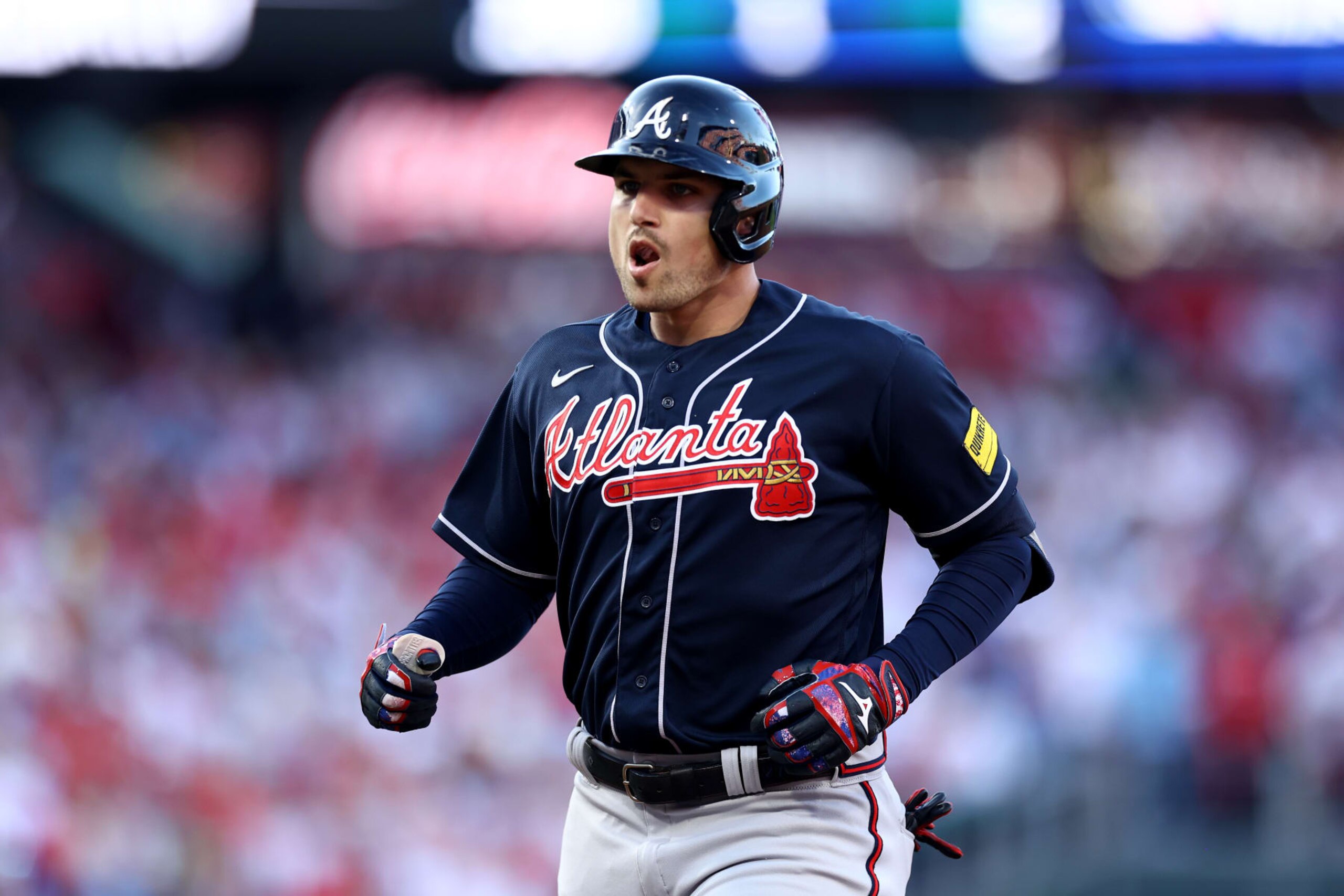 PHILADELPHIA, PENNSYLVANIA - OCTOBER 11: Austin Riley #27 of the Atlanta Braves celebrates a single against the Philadelphia Phillies during the first inning in Game Three of the Division Series at Citizens Bank Park on October 11, 2023 in Philadelphia, Pennsylvania. (Photo by Tim Nwachukwu/Getty Images)