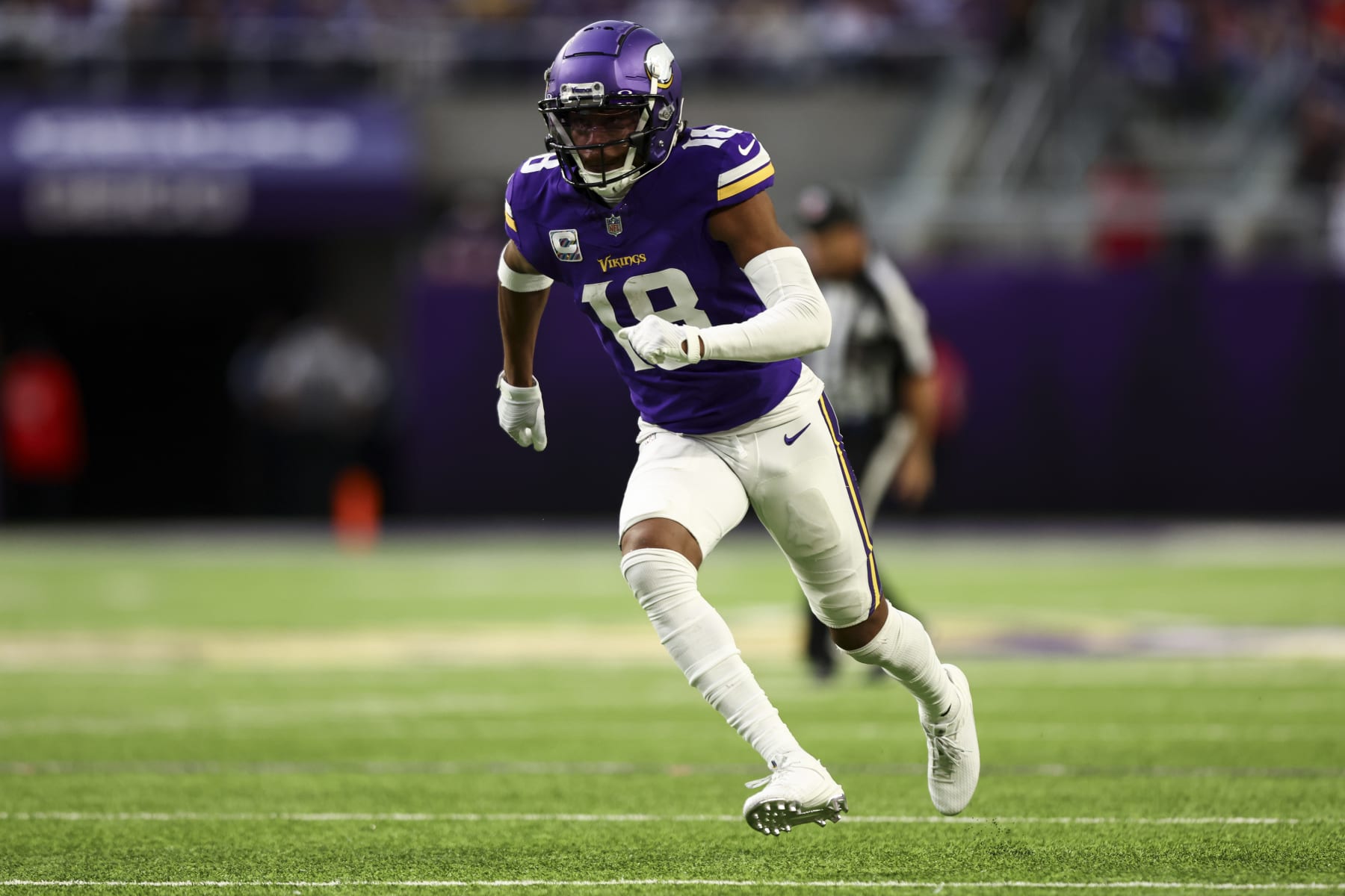 MINNEAPOLIS, MN - OCTOBER 08: Justin Jefferson #18 of the Minnesota Vikings runs downfield during the fourth quarter of an NFL football game against the Kansas City Chiefs at U.S. Bank Stadium on October 8, 2023 in Minneapolis, Minnesota. (Photo by Kevin Sabitus/Getty Images)