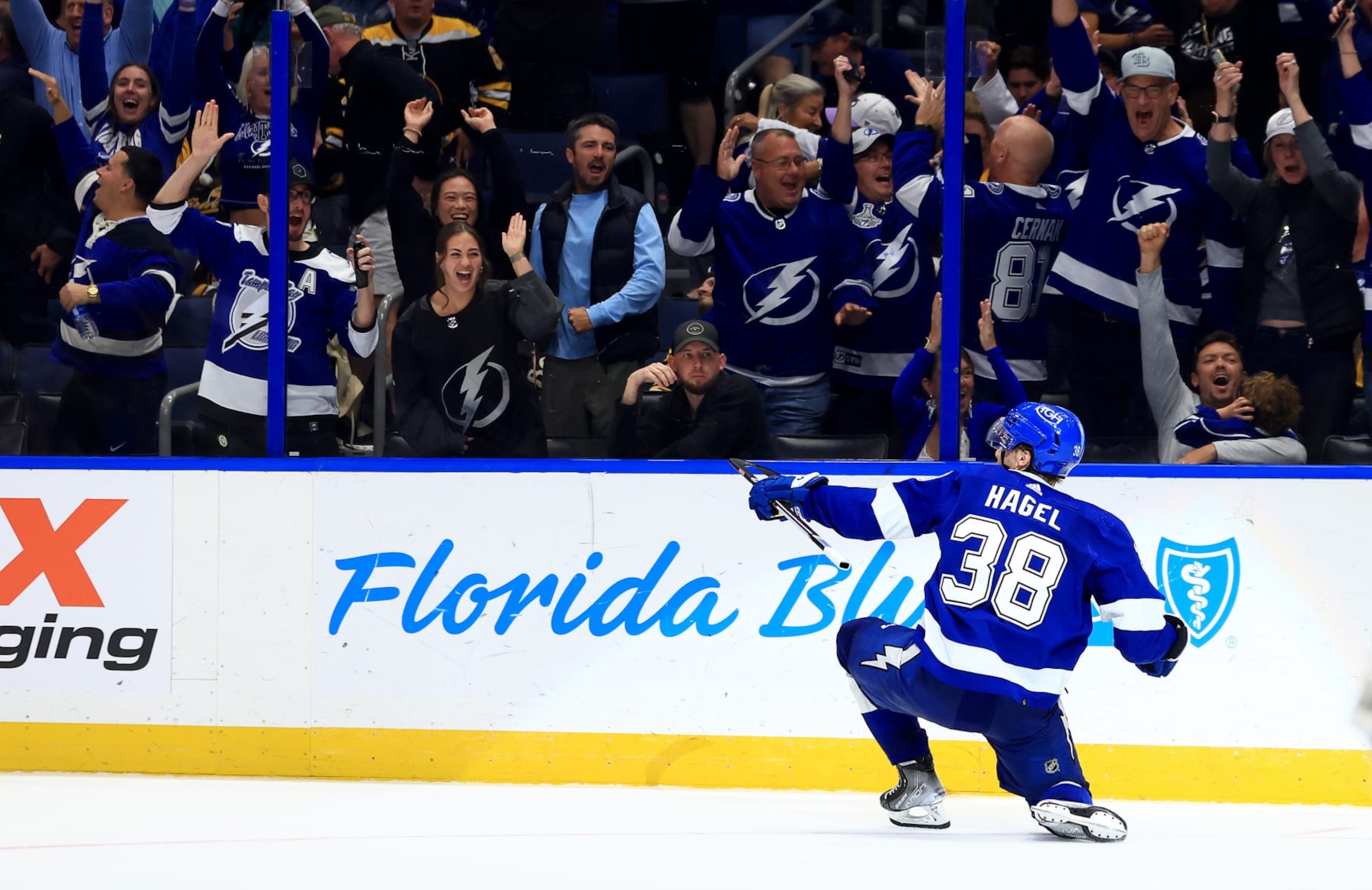 TAMPA, FLORIDA - NOVEMBER 20: Brandon Hagel #38 of the Tampa Bay Lightning celebrates a game winning goal in overtime during a game against the Boston Bruins at Amalie Arena on November 20, 2023 in Tampa, Florida. (Photo by Mike Ehrmann/Getty Images)